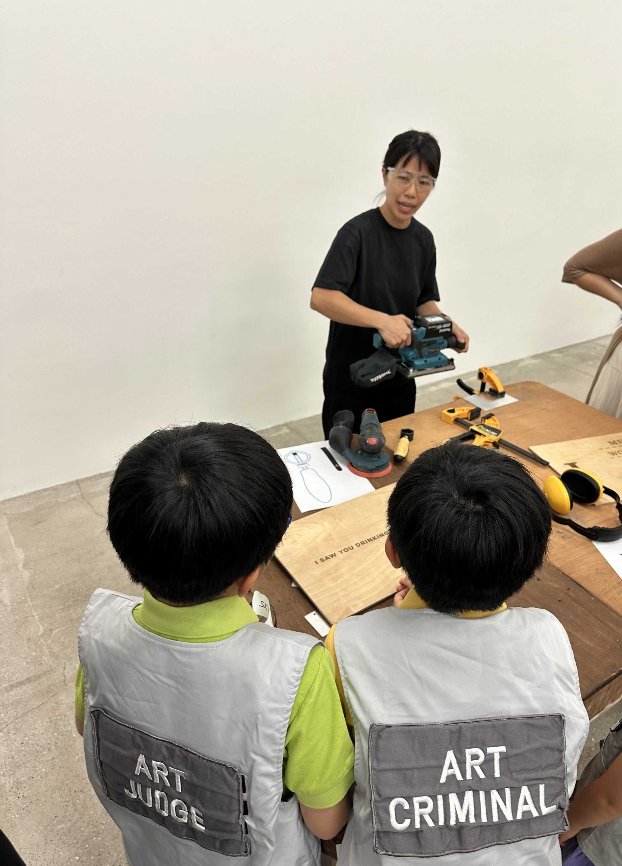 Thyler and Skyler Ng at a workshop in Tai Kwun. Photo: Handout