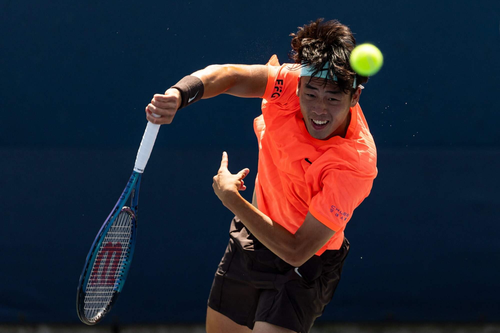 Coleman Wong serves against Aleksandar Kovacevic of the United States in the first round of the men’s singles at the US Open. Photo: Mike Frey-Imagn Images