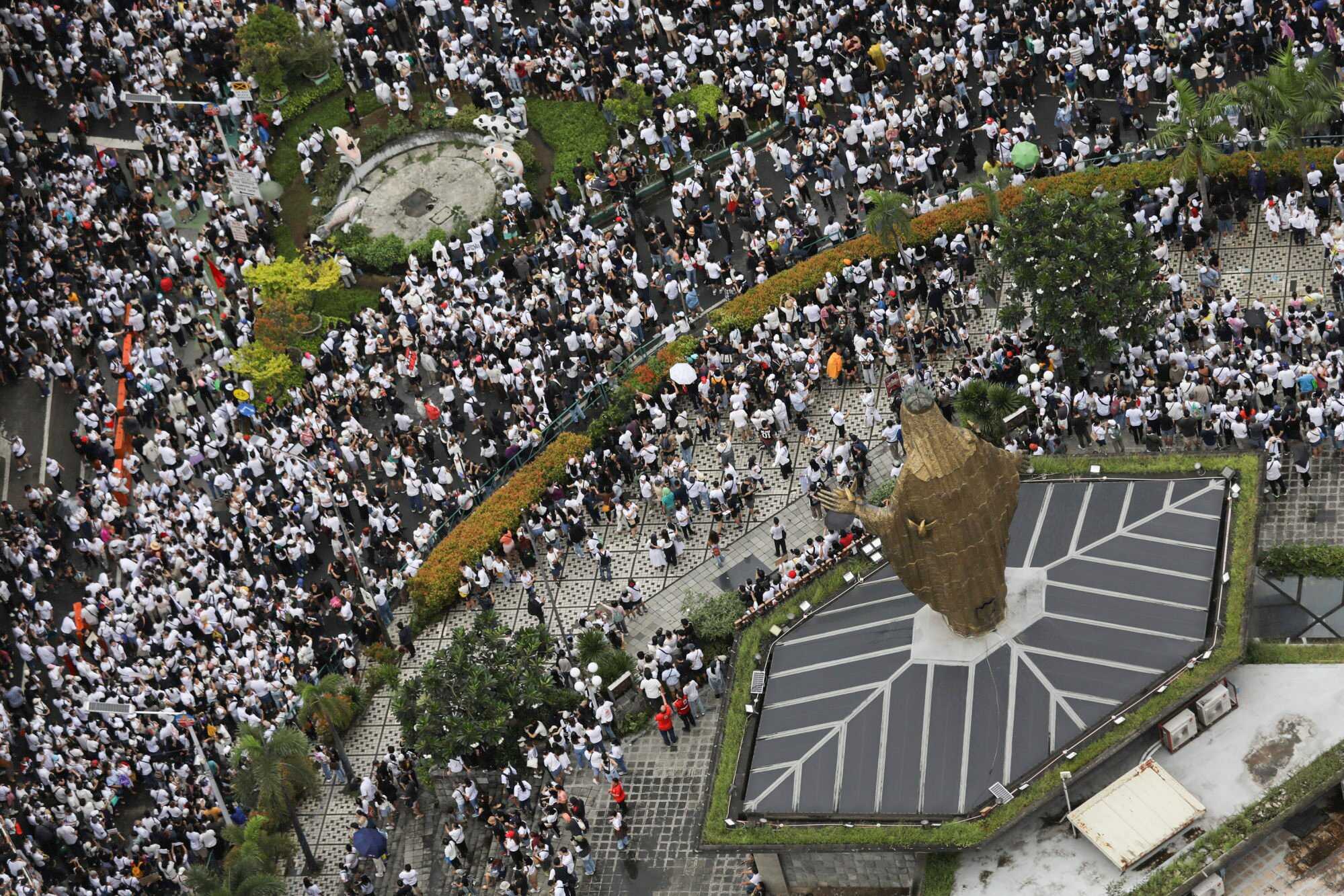 Protesters gather at the EDSA People Power Monument to rally against corruption. Photo: AP