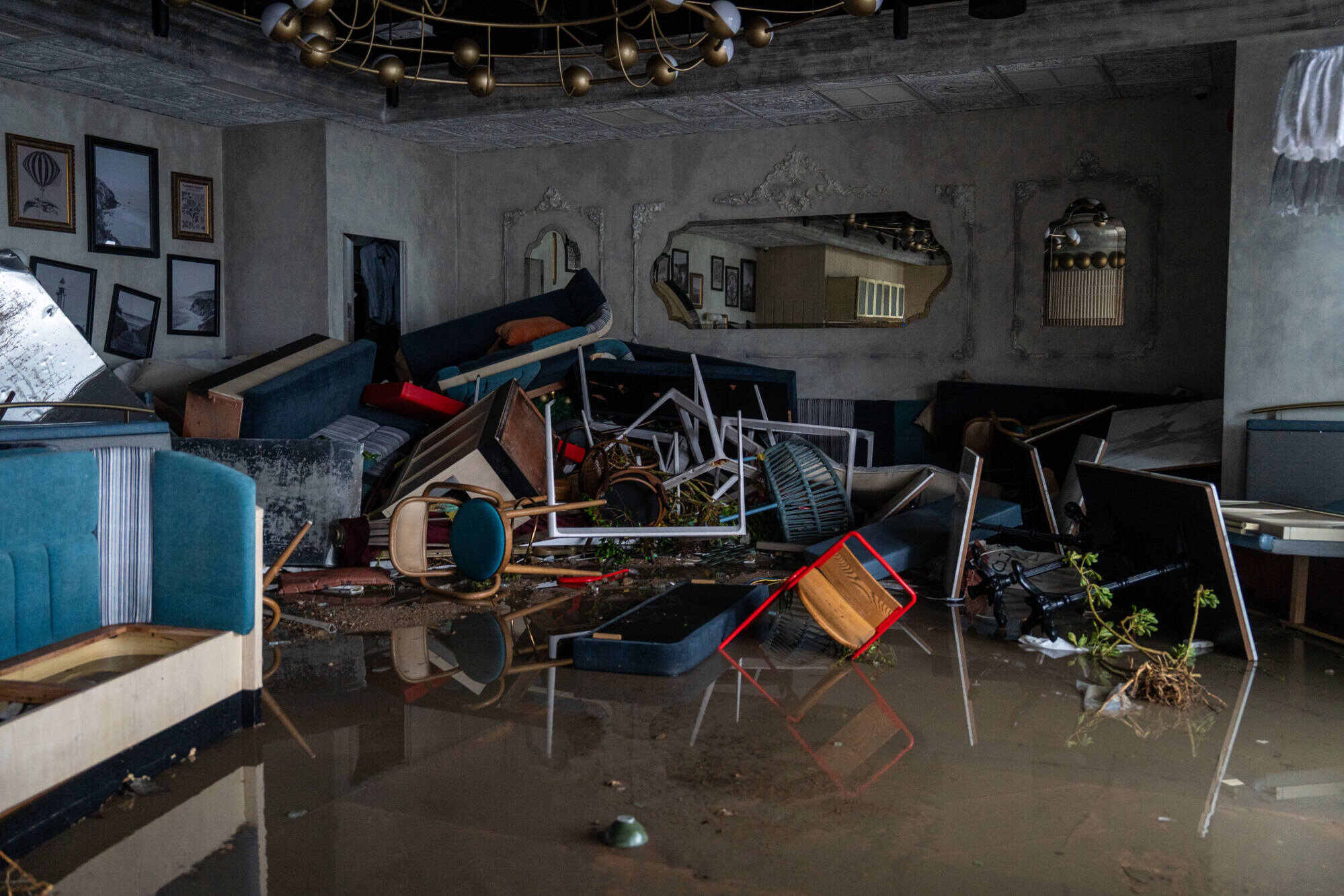 The inside of a restaurant damaged by seawater in Tseung Kwan O. Photo: dpa