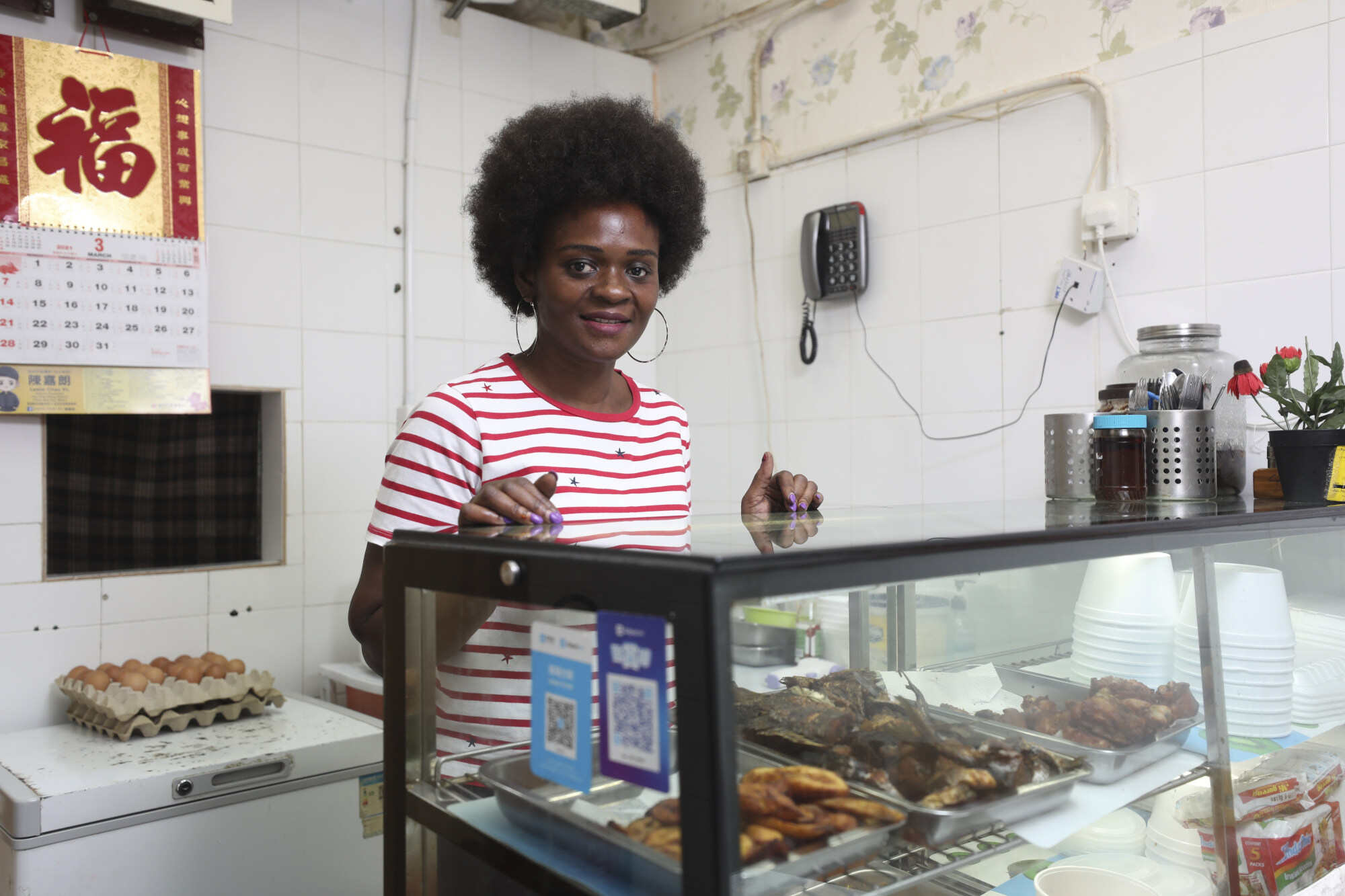 Tess Karl Buah, the owner of Ghana Locals, an African restaurant in Hong Kong, is dedicated to sharing her culture and cuisine while fostering community connections among diverse customers. Photo: Xiaomei Chen