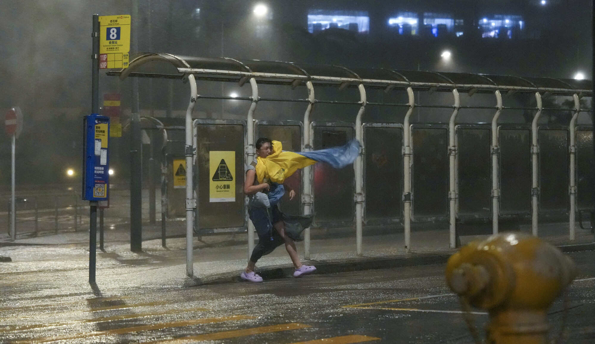 Super Typhoon Ragasa lashes Hong Kong as a pedestrian struggles against strong winds and heavy rain in Heng Fa Chuen. Photo: Karma Lo