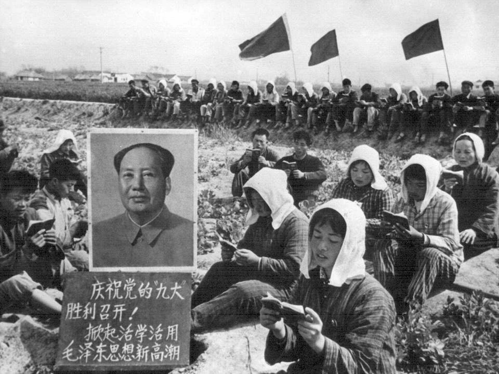 Chinese peasants read from Mao Zedong and the Communist Party’s Little Red Book. Photo: AFP