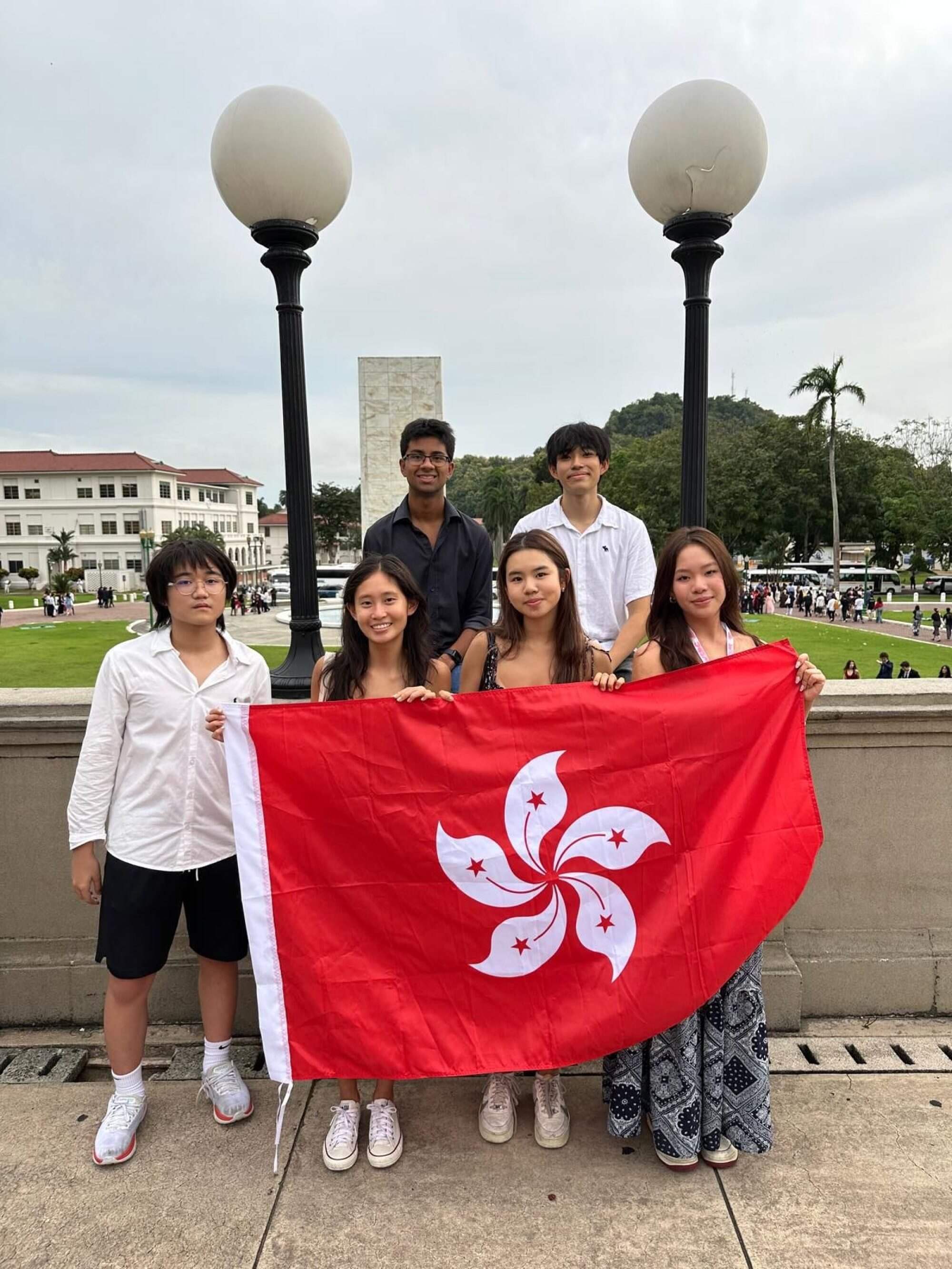 Front row, from left to right: Cyrus Leung (observer), Lauren Tse, Mollie Mei, and Jeanine Cheng. Back row, from left to right: Advik Sharma and Juhyun Nam. Photo: Handout