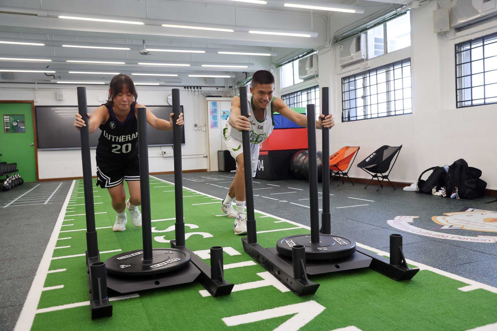 Basketball players Tam Hei-tung (left) and Ray Lin during a training session. Photo: Edmond So
