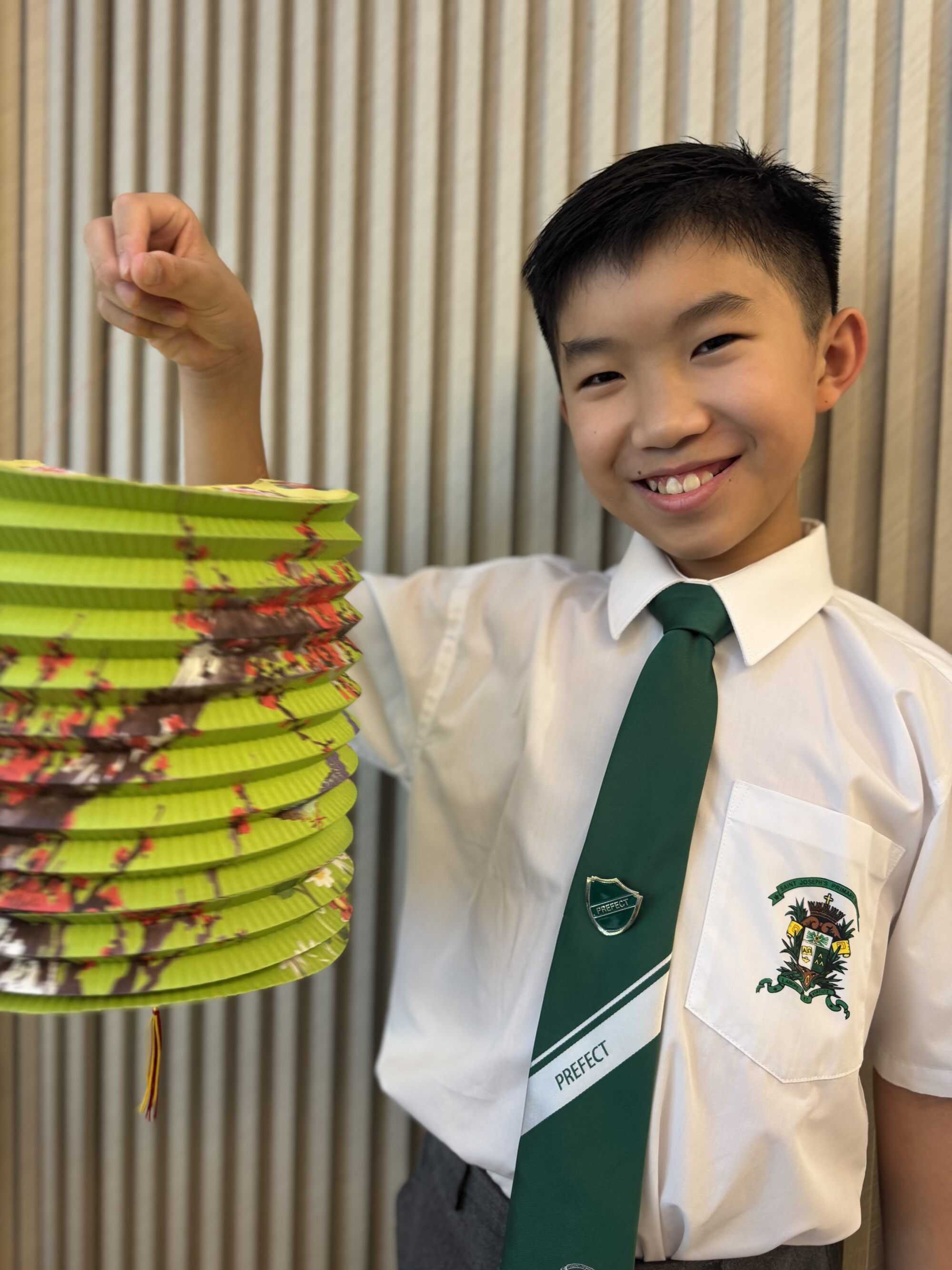 Quentin Shih, a pupil at St Joseph’s Primary School, shares his lantern for Mid-Autumn festival. Photo: Handout
