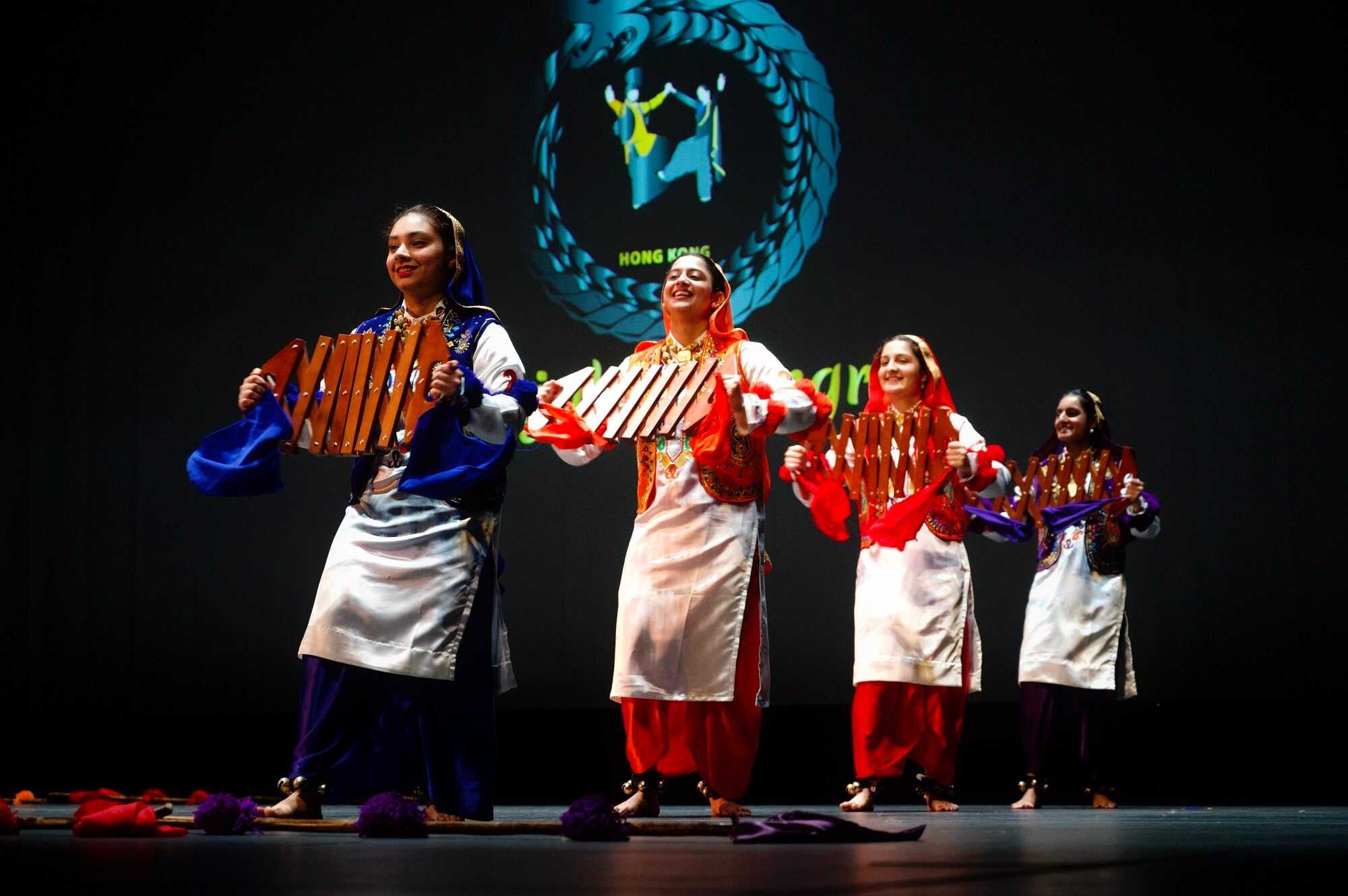 Simran Pancholi (left) and Bhavneet Kaur (second from left) compete in the International Bhangra Competition in Hong Kong in August. Photo: Handout