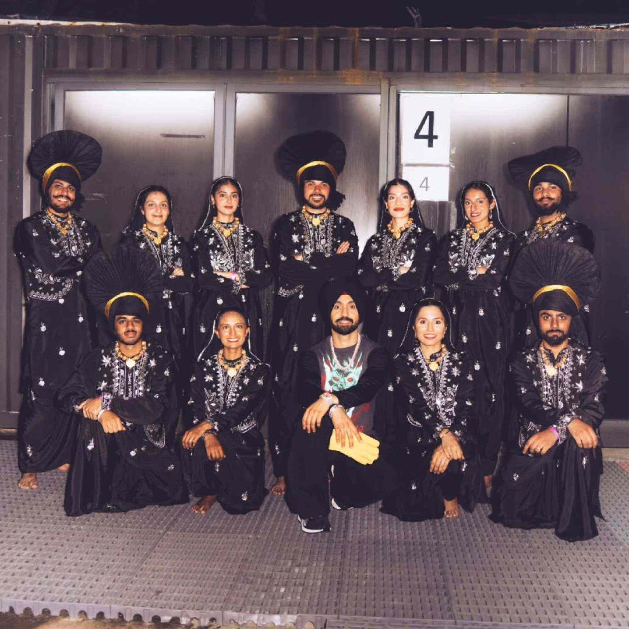 Members of Hong Kong-based bhangra group Funjabi joined Indian pop icon Diljit Dosanjh (front row, centre) for his performance in Hong Kong on September 28, 2025. Photo: Instagram/FunjabiHK