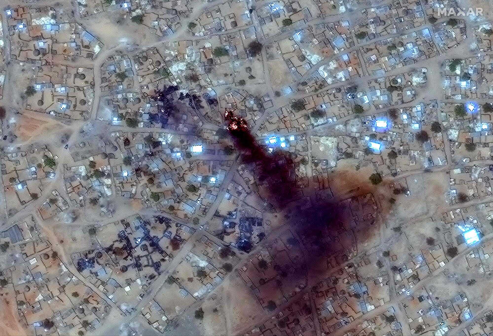 This handout image, courtesy of Maxar Technologies, shows fire and smoke at the Zamzam camp near the besieged Darfur city of El-Fasher. Photo: Maxar Technologies via AFP