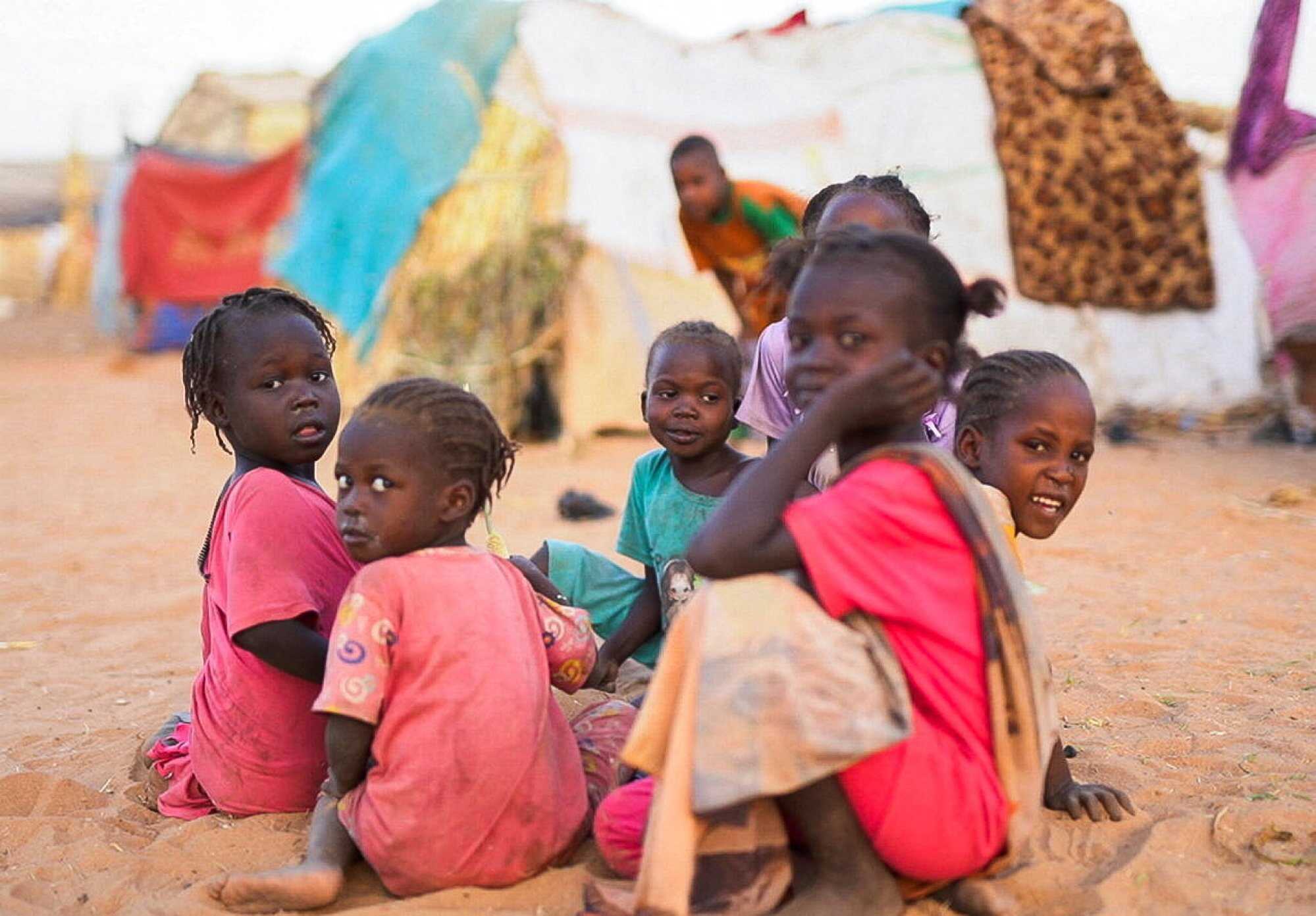 Displaced Sudanese children who fled violence in El-Fasher sit inside a camp shelter in Tawila. Photo: Reuters