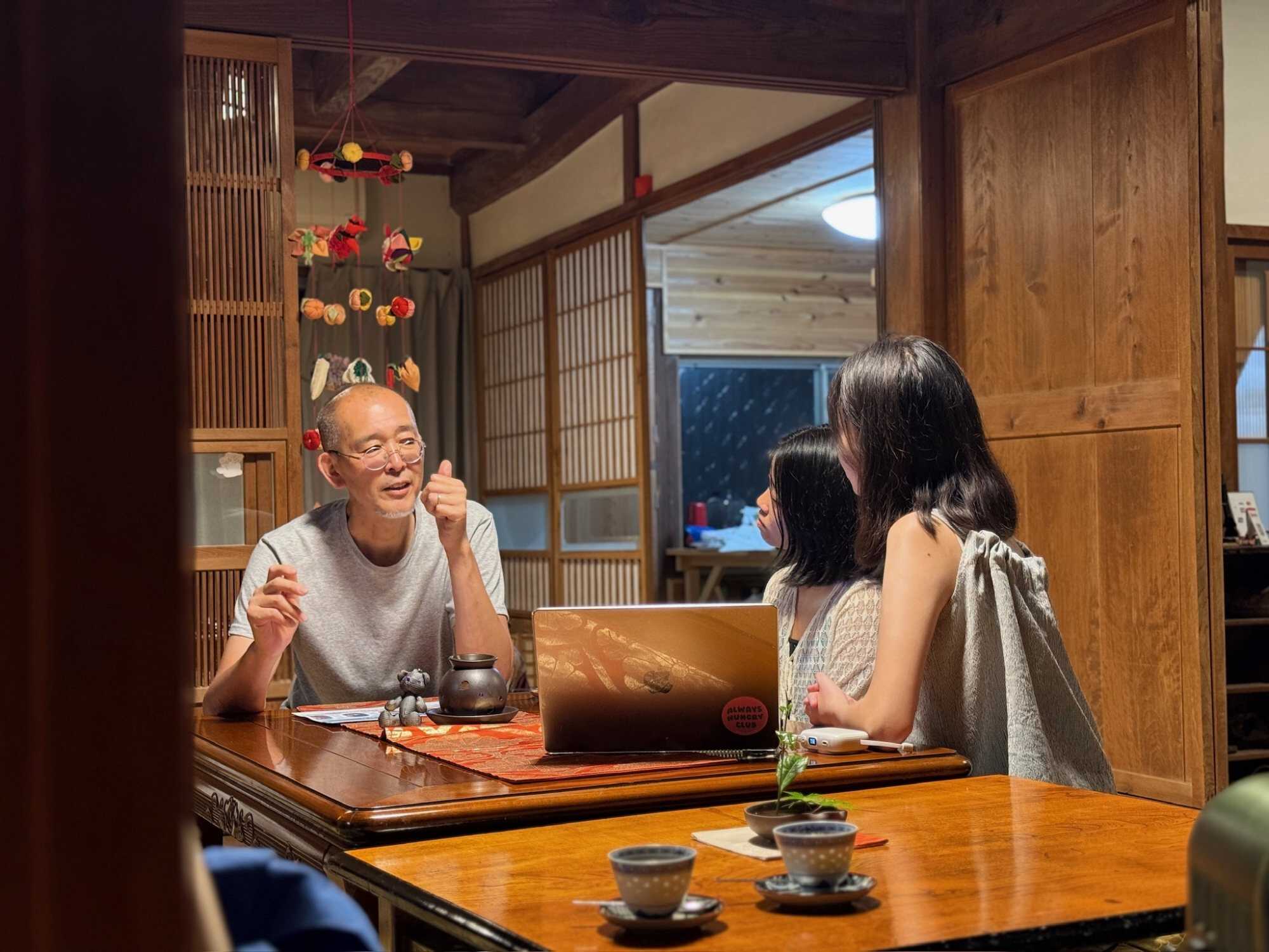 Tammy Tam and Yanice So share the advice they learned from Yamada-san (left), the owner of the farm they visited. Photo: Handout