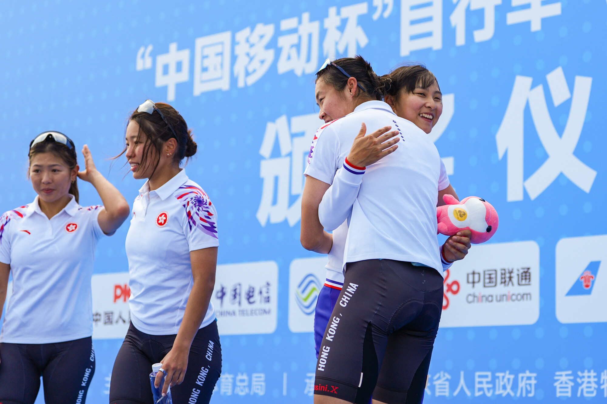 Chloe Leung Wing-yee (right) and her teammates celebrate with Ceci Lee Sze-wing (second from right) after her win in the women’s individual competition of the 15th National Games. Photo: Eugene Lee