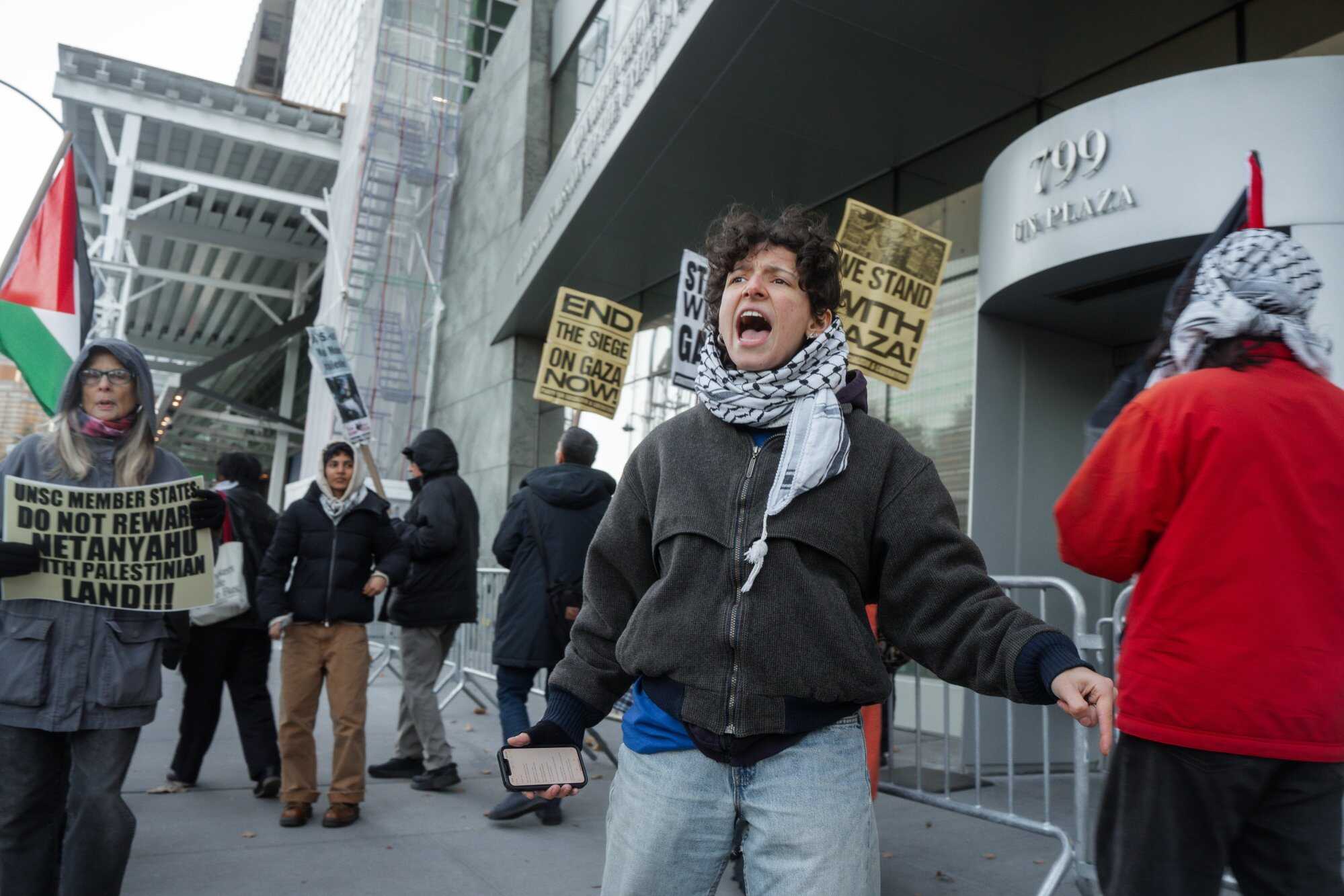 A pro-Palestinian protester shouts slogans outside the United Nations Headquarters in New York ahead of the UN Security Council vote. Photo: EPA