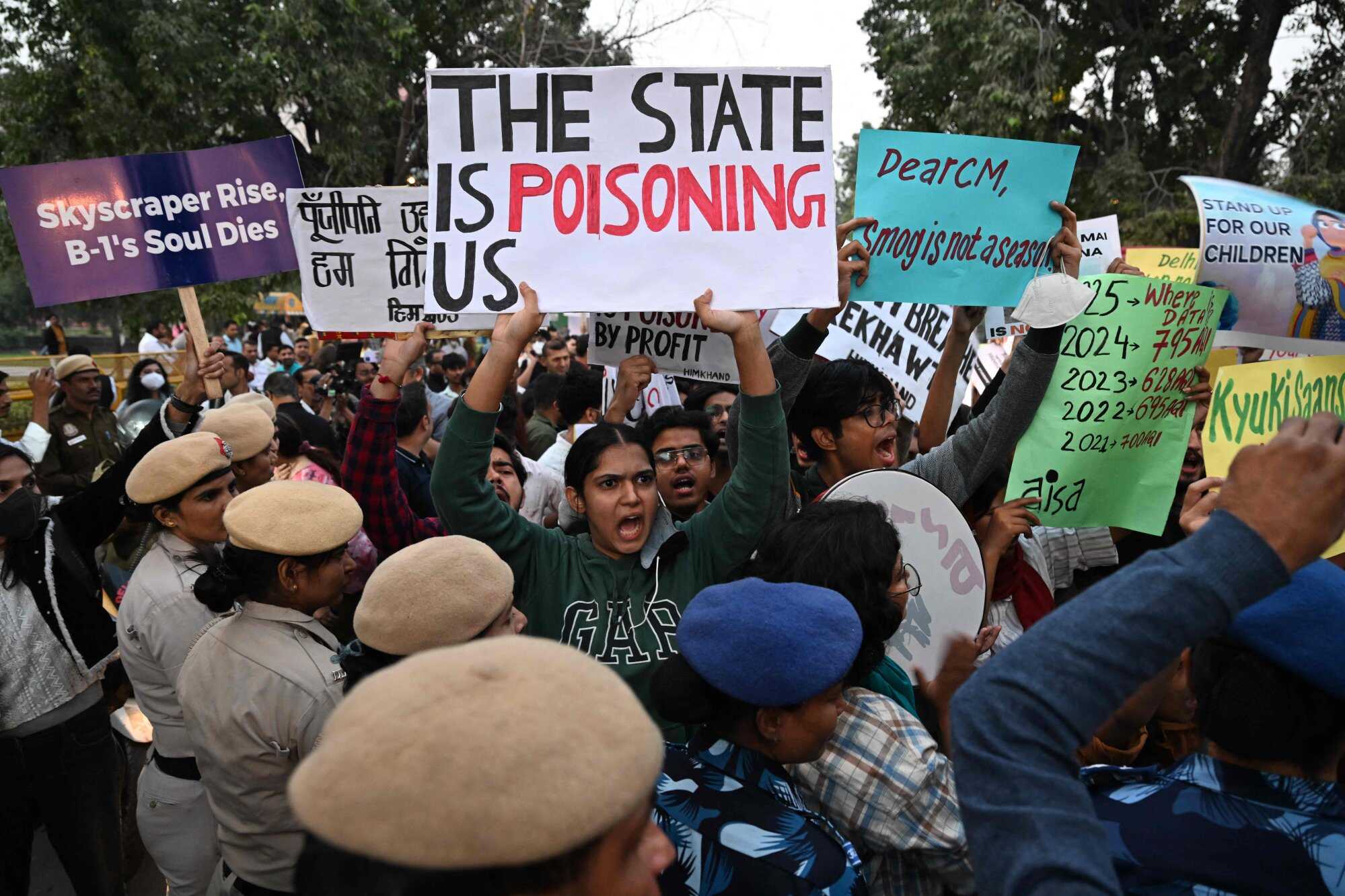 Delhi residents protested what they called the government’s lack of action to combat air pollution in the city. Photo: AFP