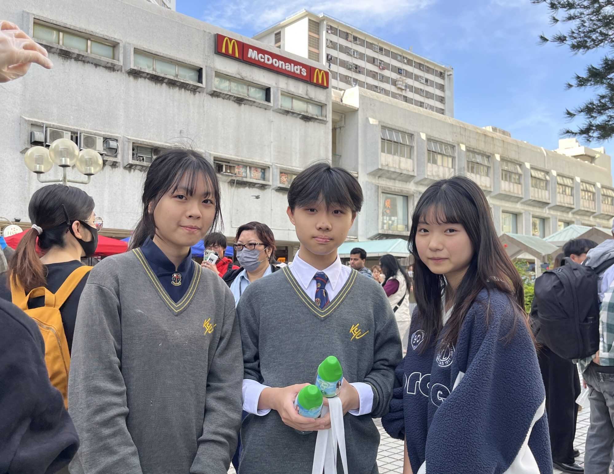 Student volunteer Issac Cheung (centre) from Kau Yan College has joined volunteer efforts in Tai Po. Photo: Handout