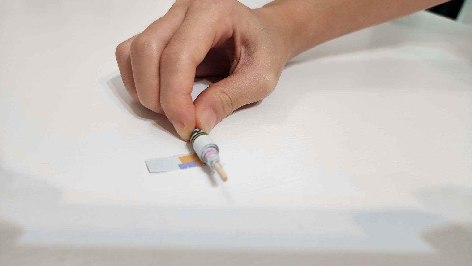To make a paper bead, use a toothpick and roll paper strips tightly. Photo: JEMS Character Academy