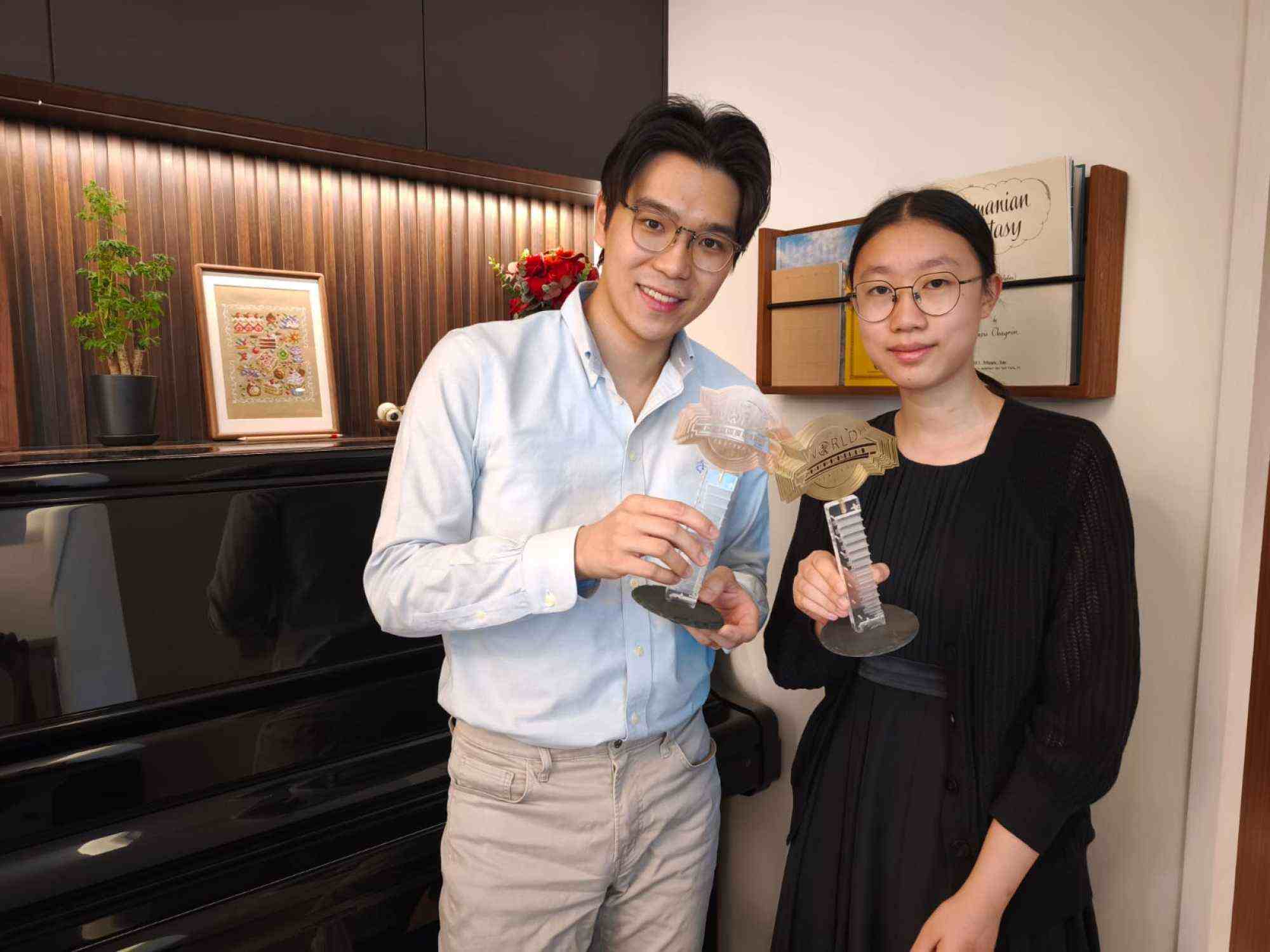 Amanda teamed up with her teacher, professional harmonicist Kelvin Leung, to compete in the Duet Adult category, where the pair secured third place. Photo: Handout
