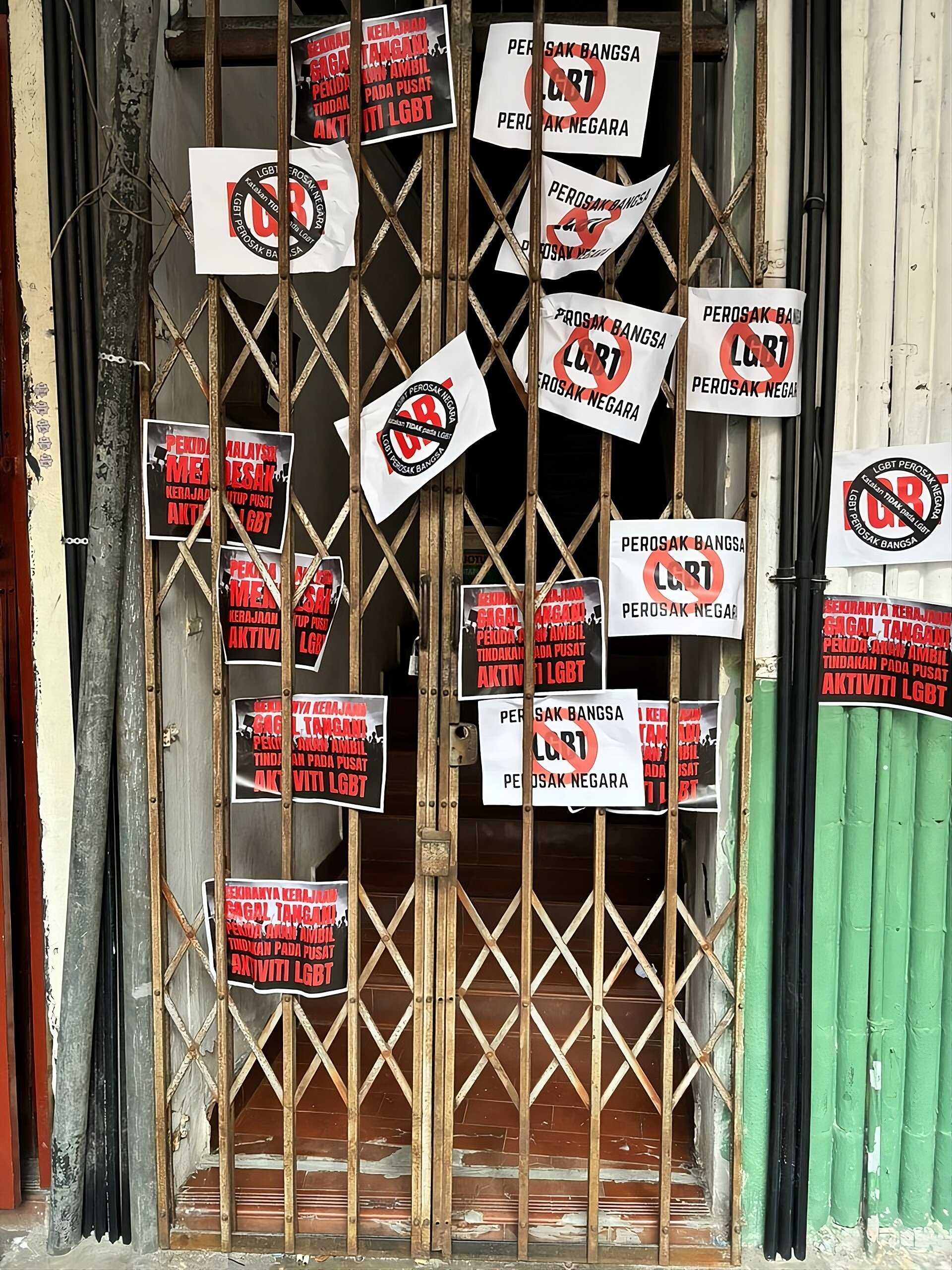 “Anti-LGBT” and “nation destroyer” stickers are seen plastered outside the entrance of a men’s only spa in Chow Kit, Kuala Lumpur, by a Malay nationalist group after the venue was raided by police in November. Photo: Facebook/pekidamalaysiarasmi
