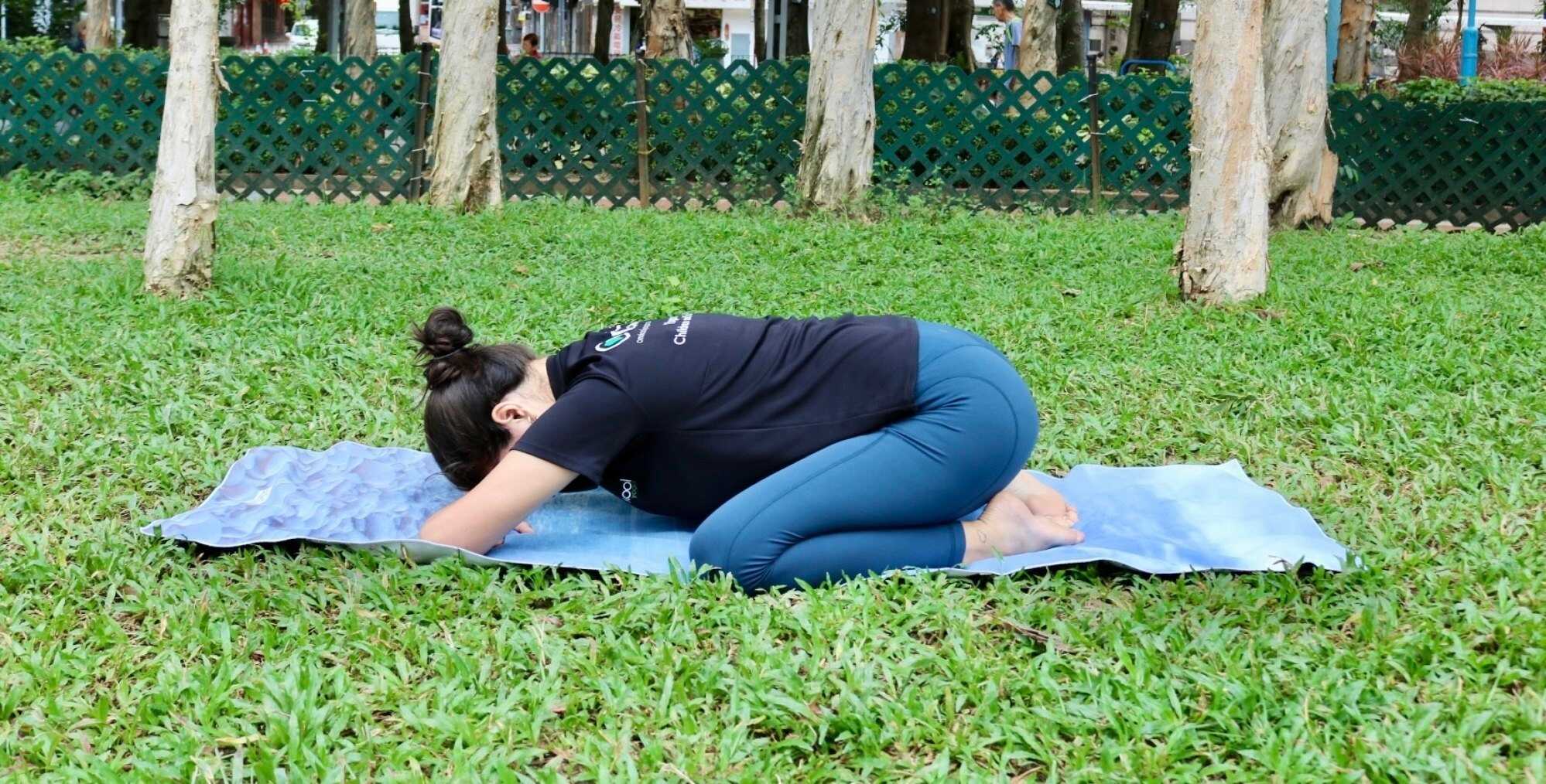 Alison Drake demonstrates the child’s pose. Photos: Handout