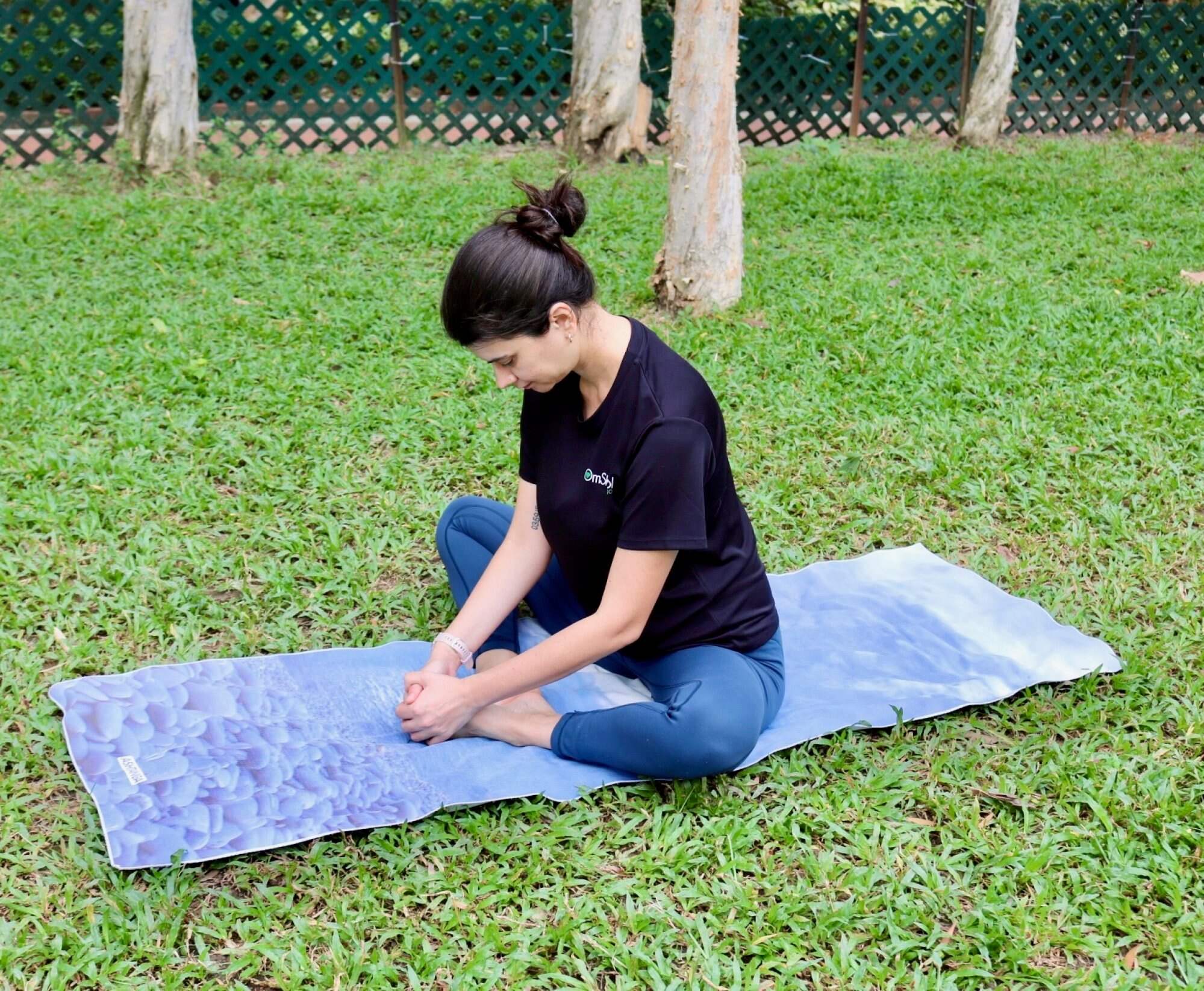 Feel free to move your knees while doing the butterfly pose. Photo: Handout