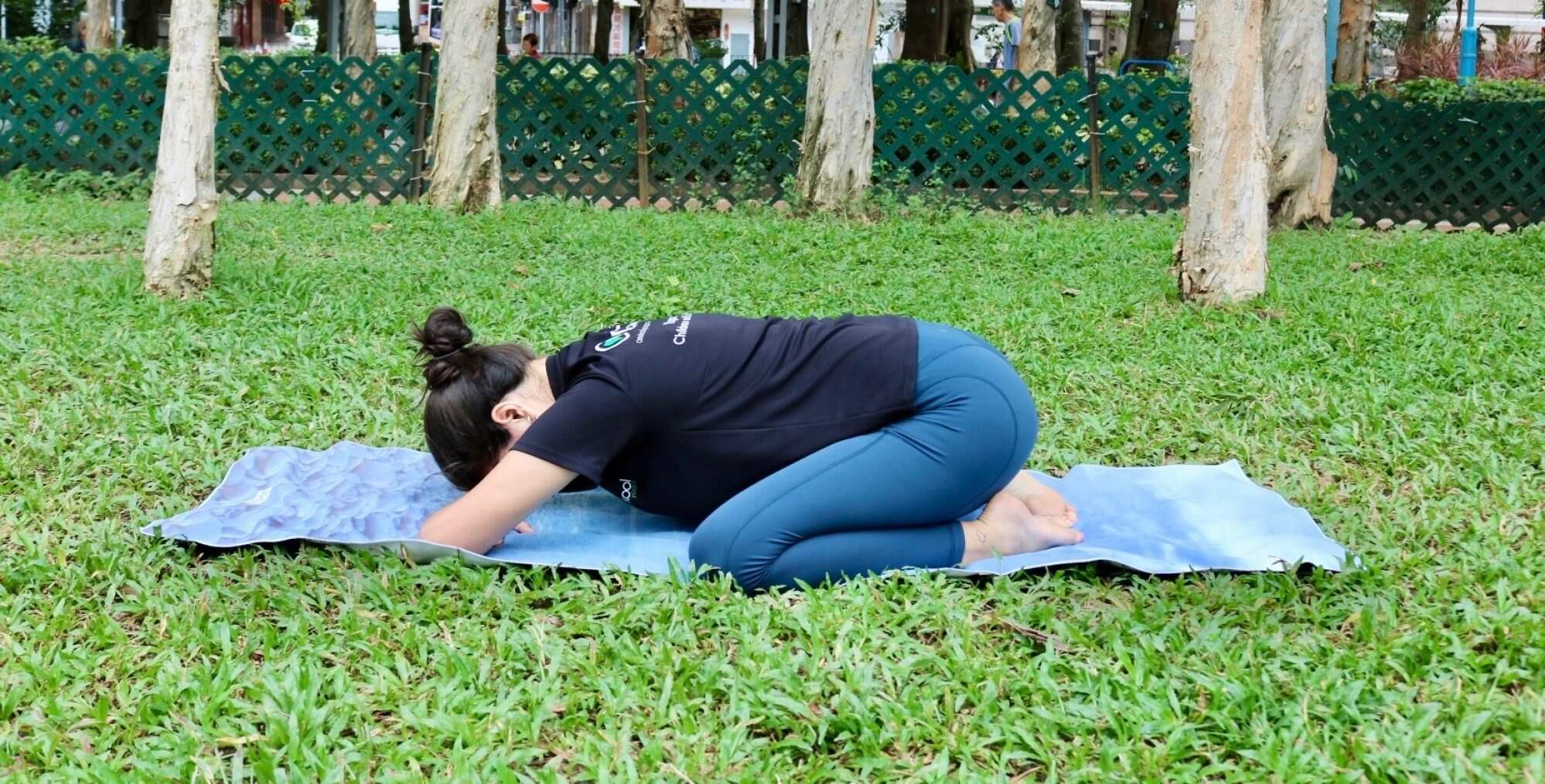 Alison Drake demonstrates the child’s pose. Photos: Handout