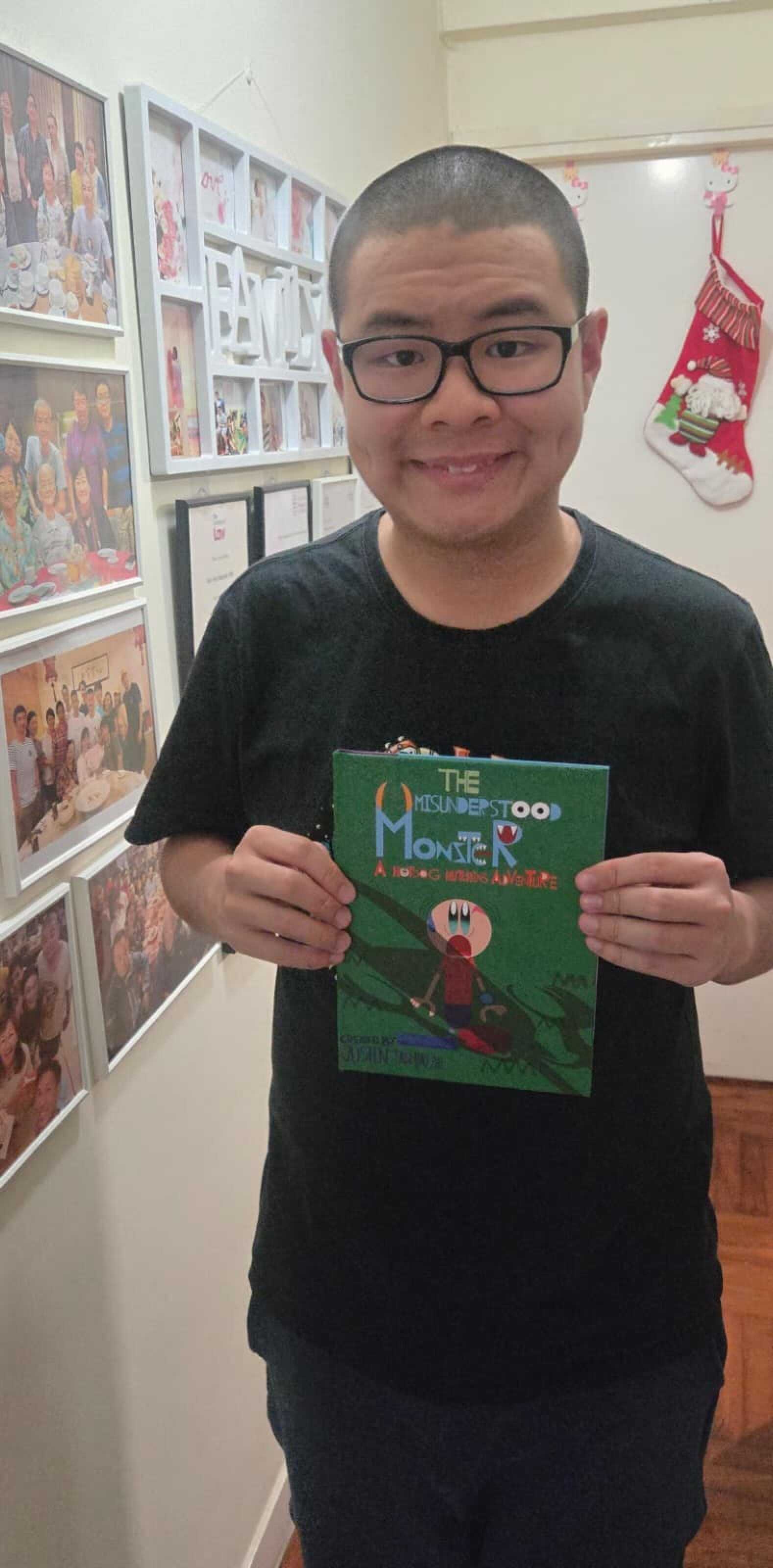 With the help of a social enterprise, Justin Tan has printed 100 copies of his book. Photo: Handout