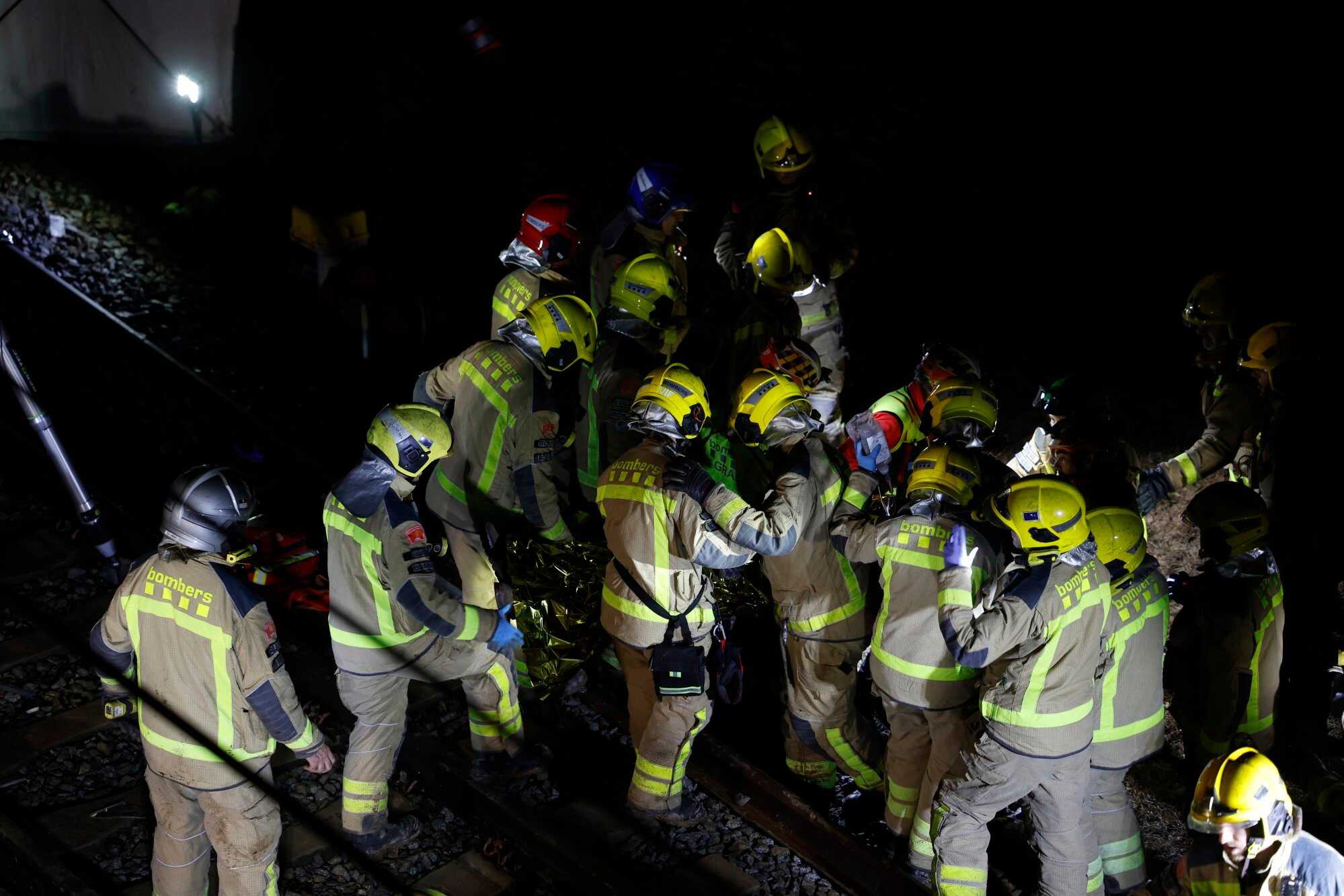 Catalonia firefighters investigate a wall that collapsed on Tuesday in Gelida, Barcelona. Photo: EPA