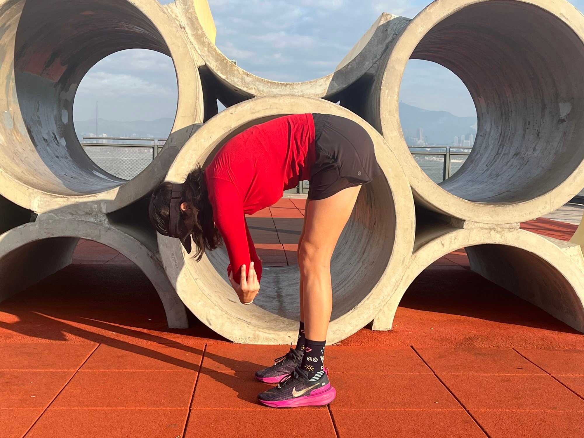 The standing forward pose stretches your hamstrings and lower back.