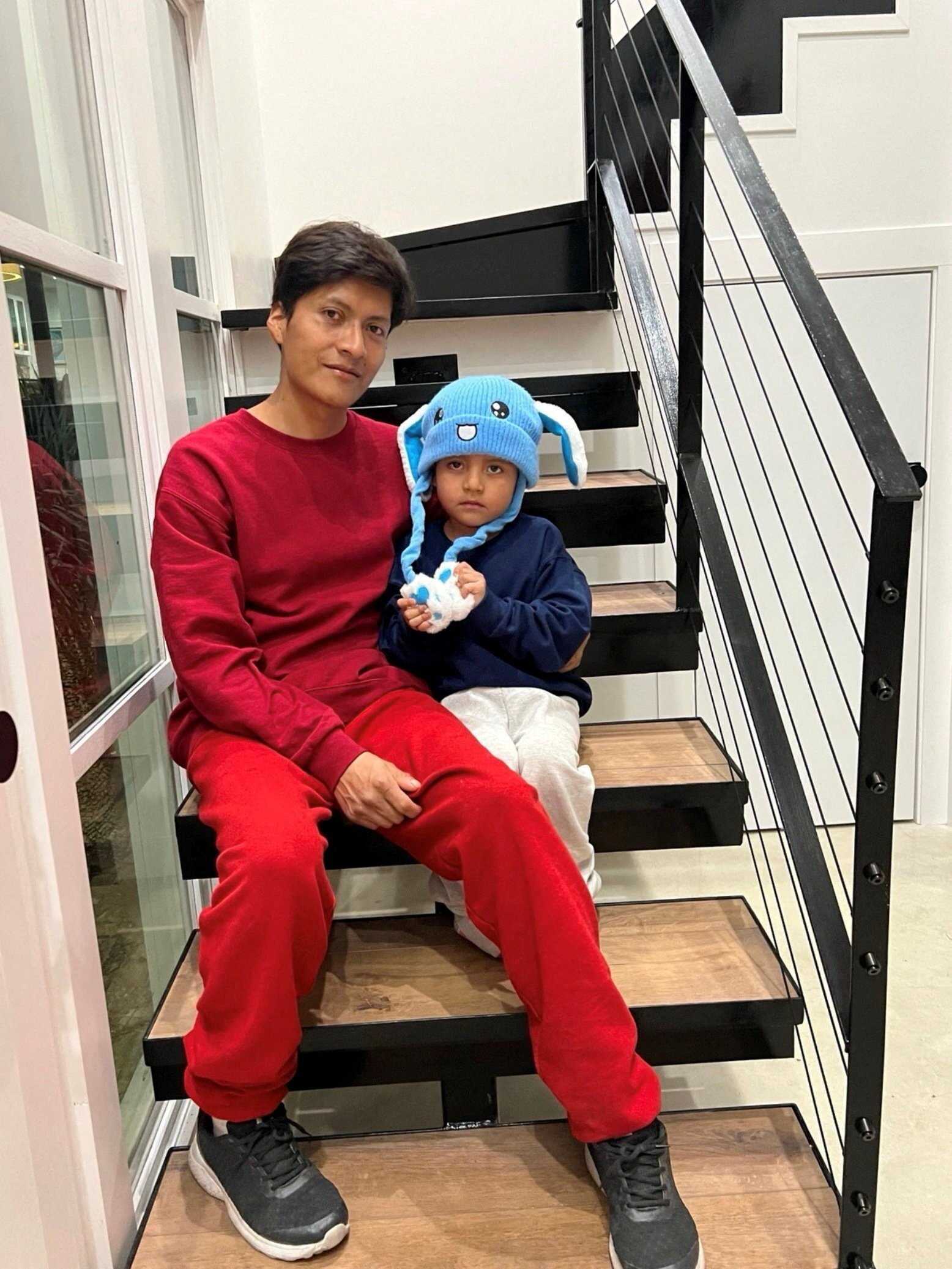 Adrian Conejo Arias and his son Liam Conejo Ramos after being released from a detention centre. Photo: Joaquin Castro via Reuters