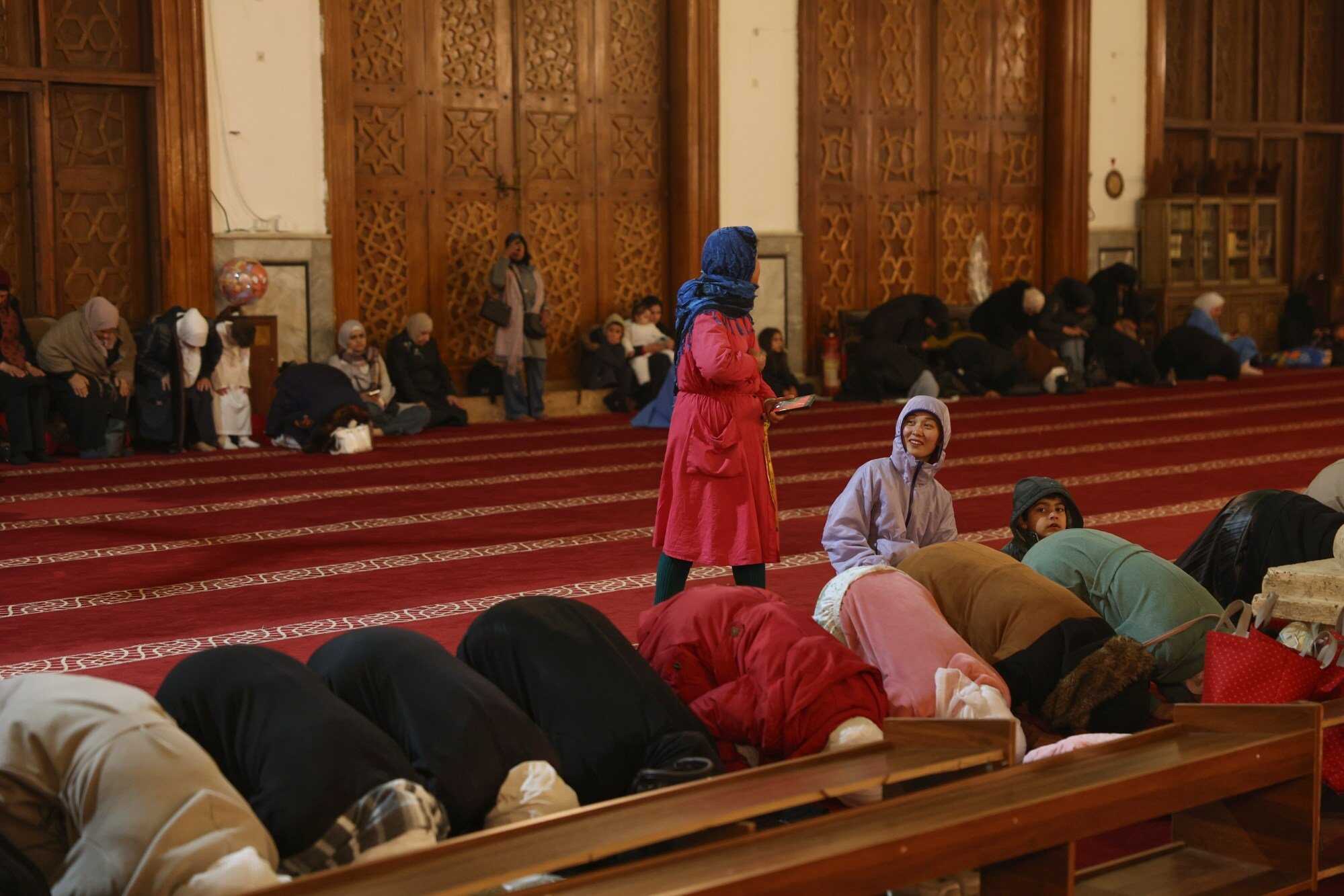 Women attend the evening Tarawih prayers on the first night of the holy fasting month of Ramadan at the Umayyad Mosque in Damascus, Syria, on Wednesday, February 18. Photo: AP