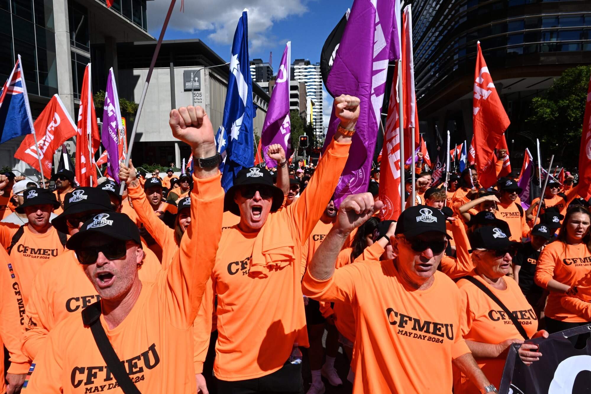 Members of the Construction, Forestry and Maritime Employees Union march to mark Labour Day in Brisbane on May 6, 2024. Industries such as mining and construction tend to have the largest gender pay gaps. Photo: EPA-EFE