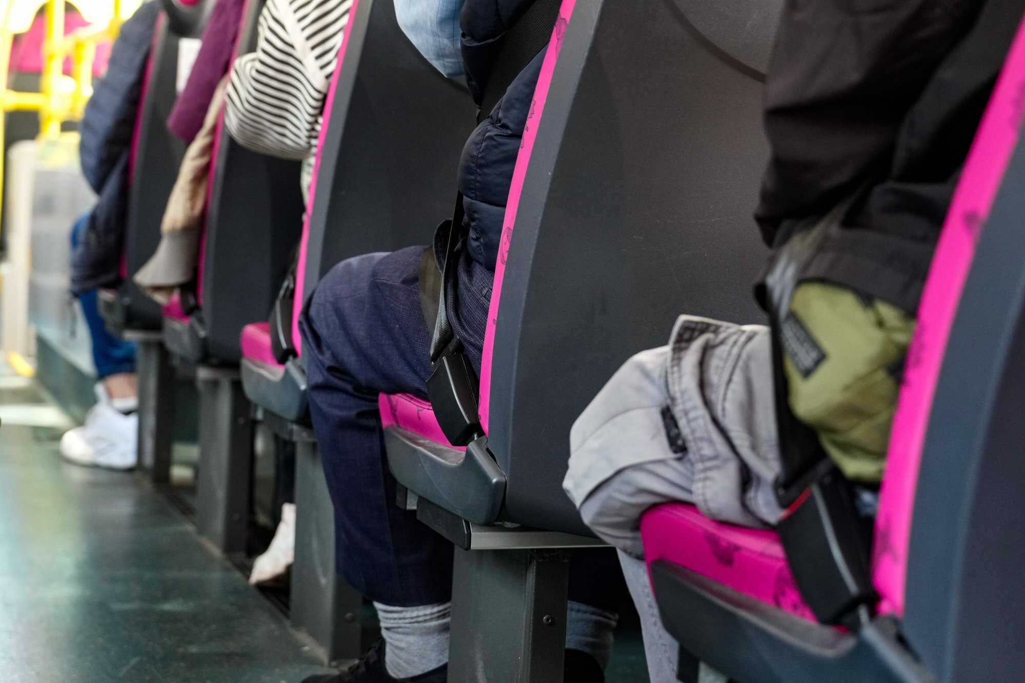 People wear seat belts on a double-decker bus in Sham Shui Po, abiding by the now-defunct seat belt law. Phot: Sam Tsang
