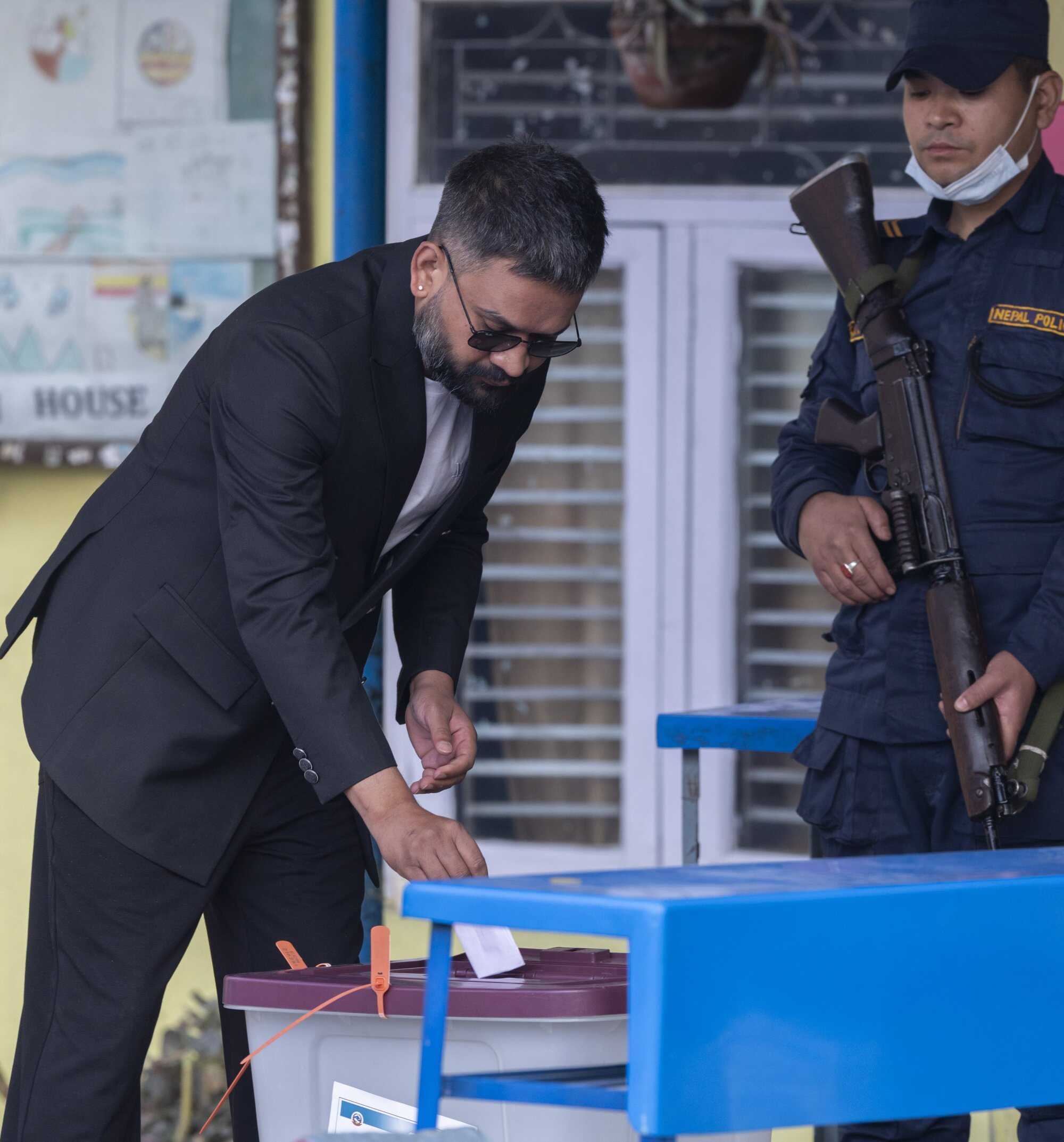 Shah casts his vote during the parliamentary election in Kathmandu on Thursday. Photo: EPA