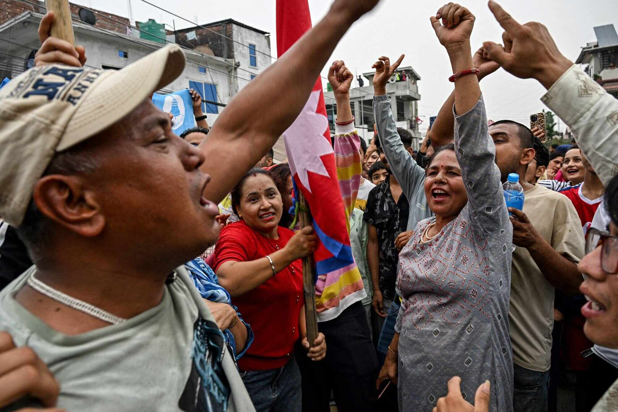 Supporters of Balen Shah and the Rastriya Swatantra Party (RSP) celebrate outside a counting centre on Saturday. Photo: AFP