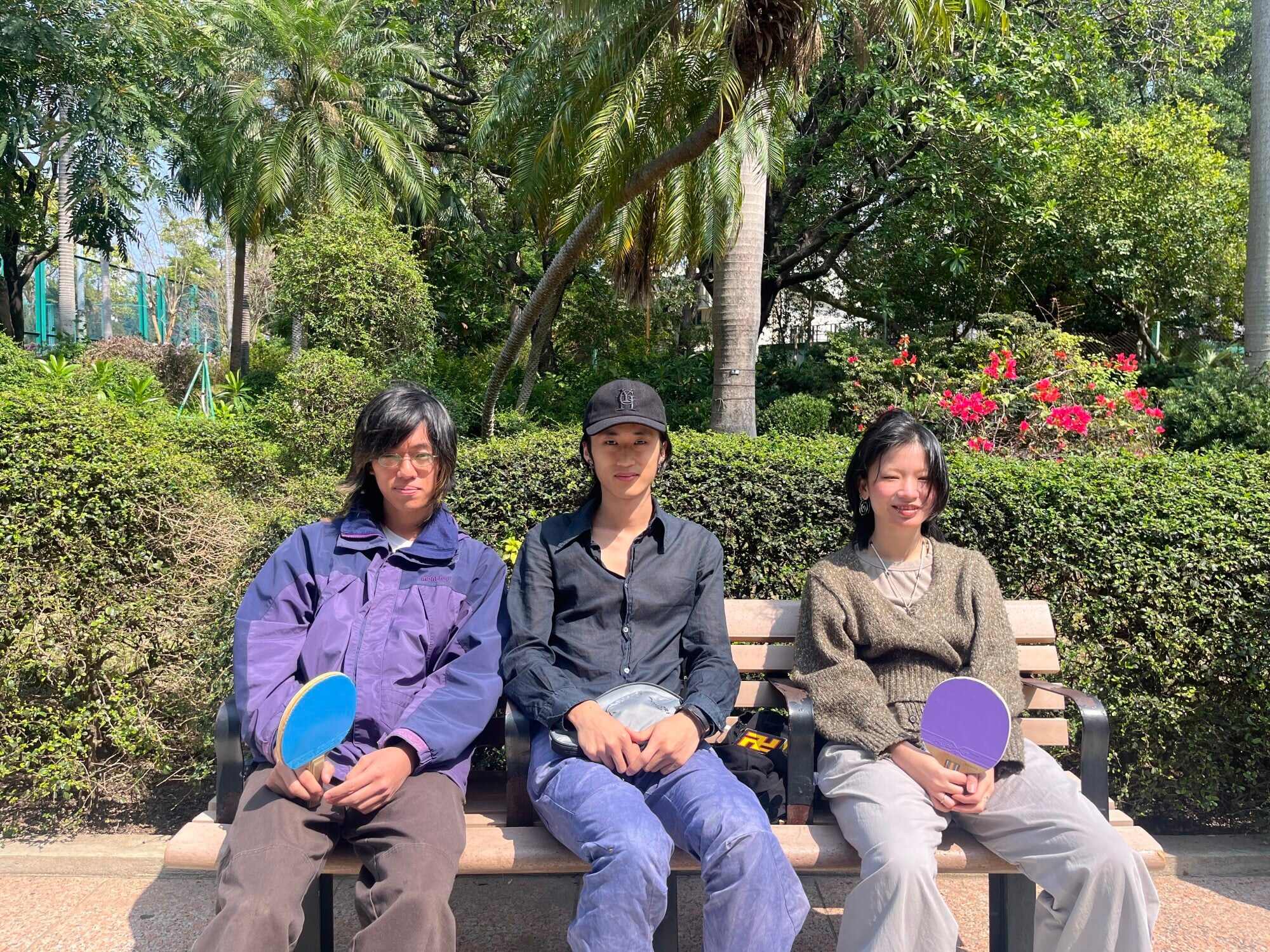 Fat* (centre) and Wood* (right) joined a table tennis tournament organised by Rosemary in the City. Photo: Kelly Fung