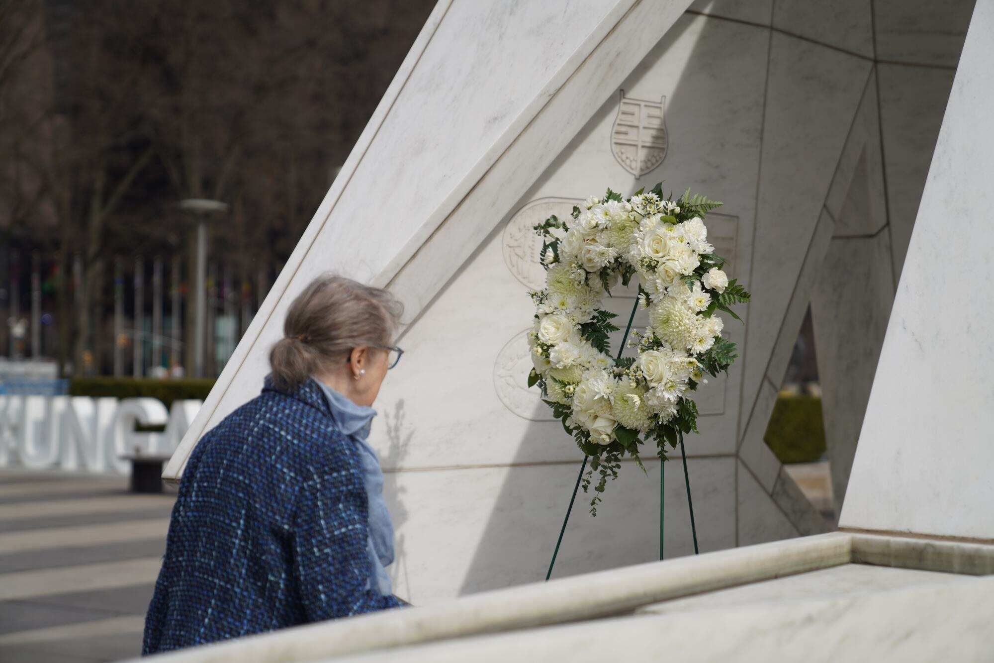 A woman visits the Art of Return memorial, unveiled in 2015 to honour victims of slavery and the transatlantic slave trade, at the UN headquarters in New York, March 25, 2026. Photo: Xinhua