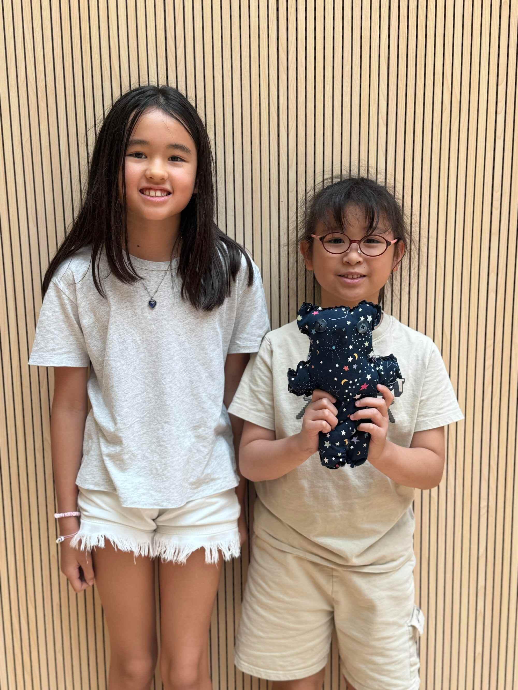 Ella Saxton (left) loves learning fun facts about foxes. Photo: Handout