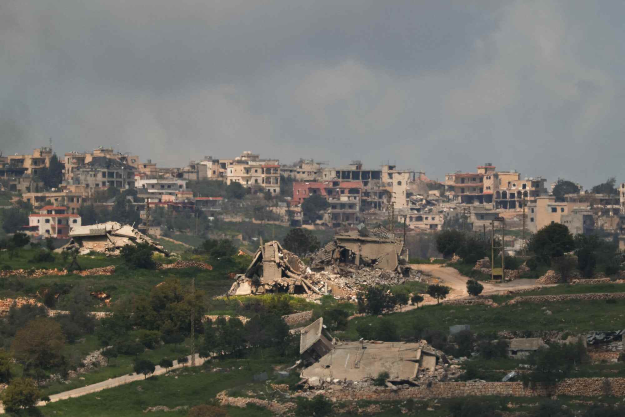 Destroyed buildings in Bint Jbeil, southern Lebanon, near the Israel-Lebanon border. The intensifying conflict in West Asia was triggered by joint US-Israeli strikes on Iran. Photo: Reuters