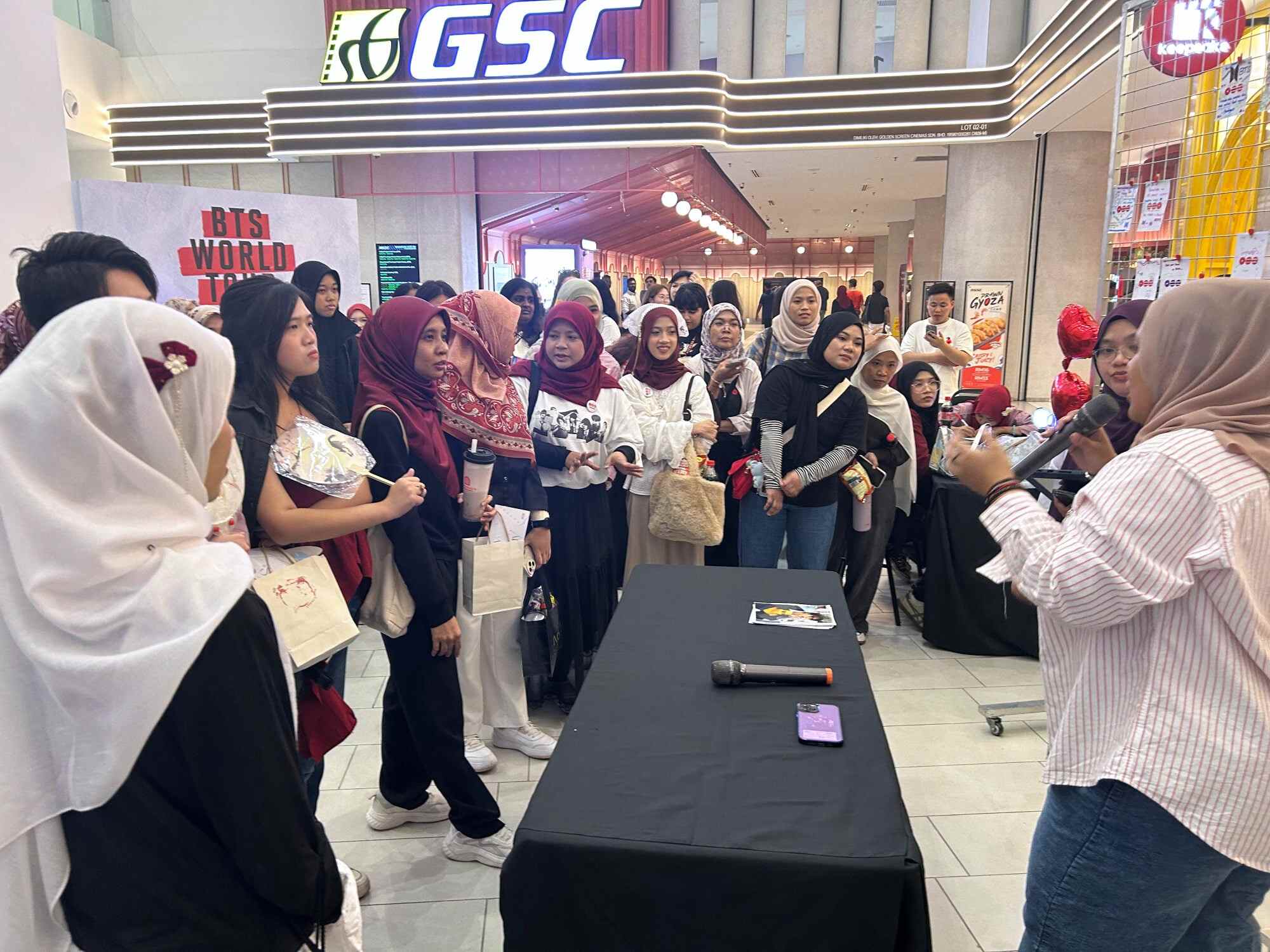 Malaysian fans of the K-pop group BTS attend a special live screening of a tour film in Kuala Lumpur. Photo: AP