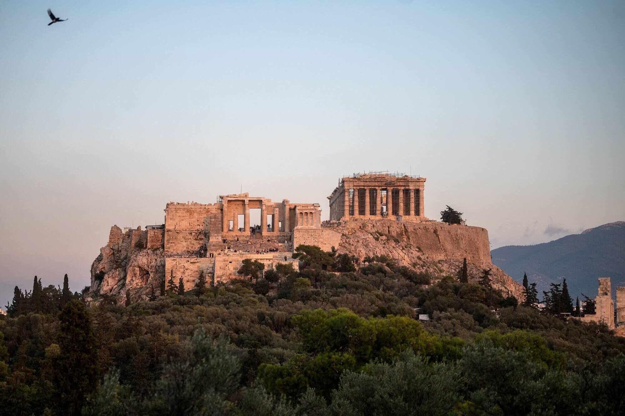 The Parthenon Temple at the top of the Acropolis hill in Athens on November 15, 2022. Scientists are examining past and present climate and geological conditions at 19 sites across Greece. Photo: AFP