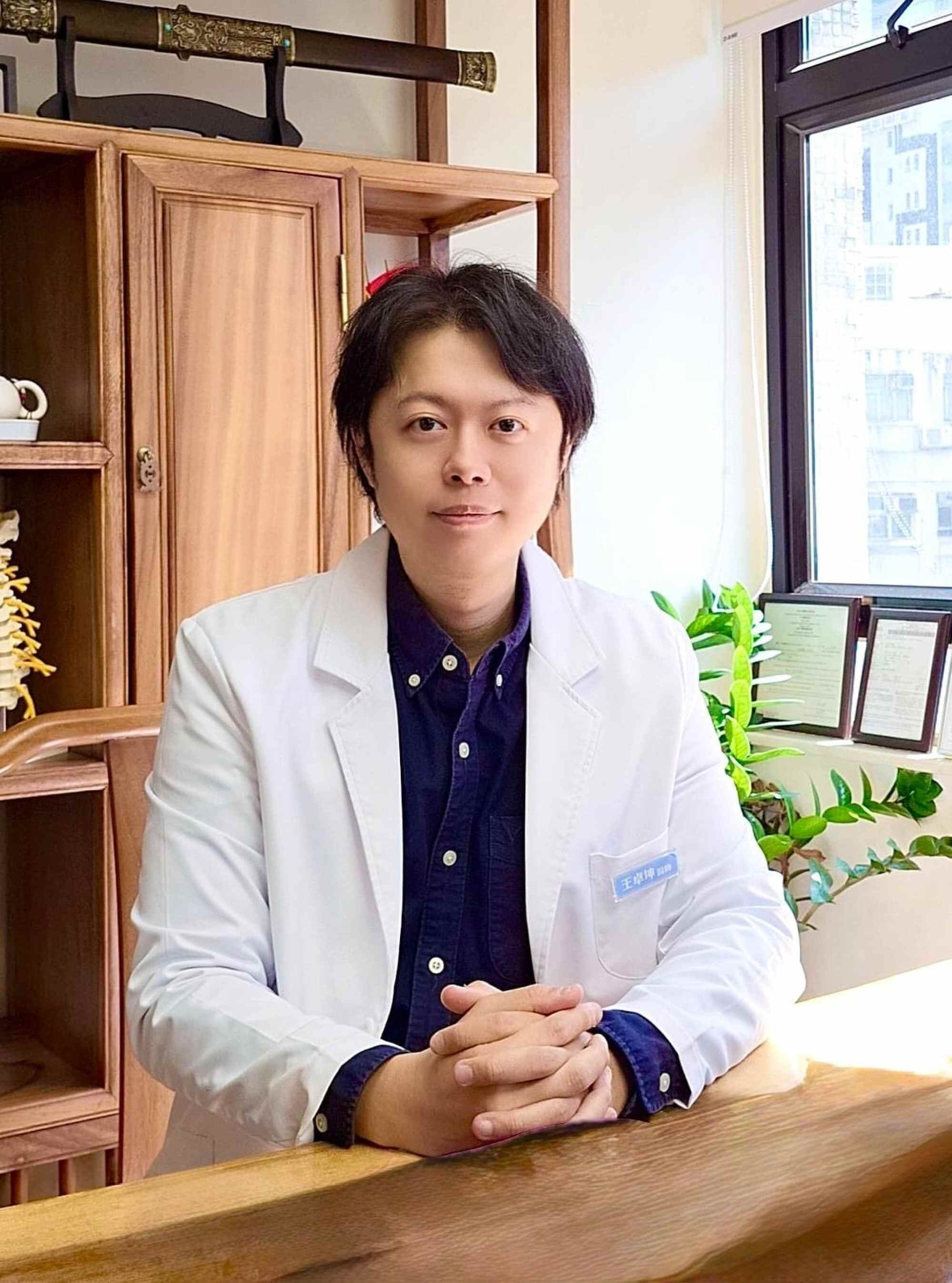 Registered Chinese medicine practitioner Quinton Wong advises avoiding cold foods and using chrysanthemum tea and acupressure to maintain balance. Photo: Handout
