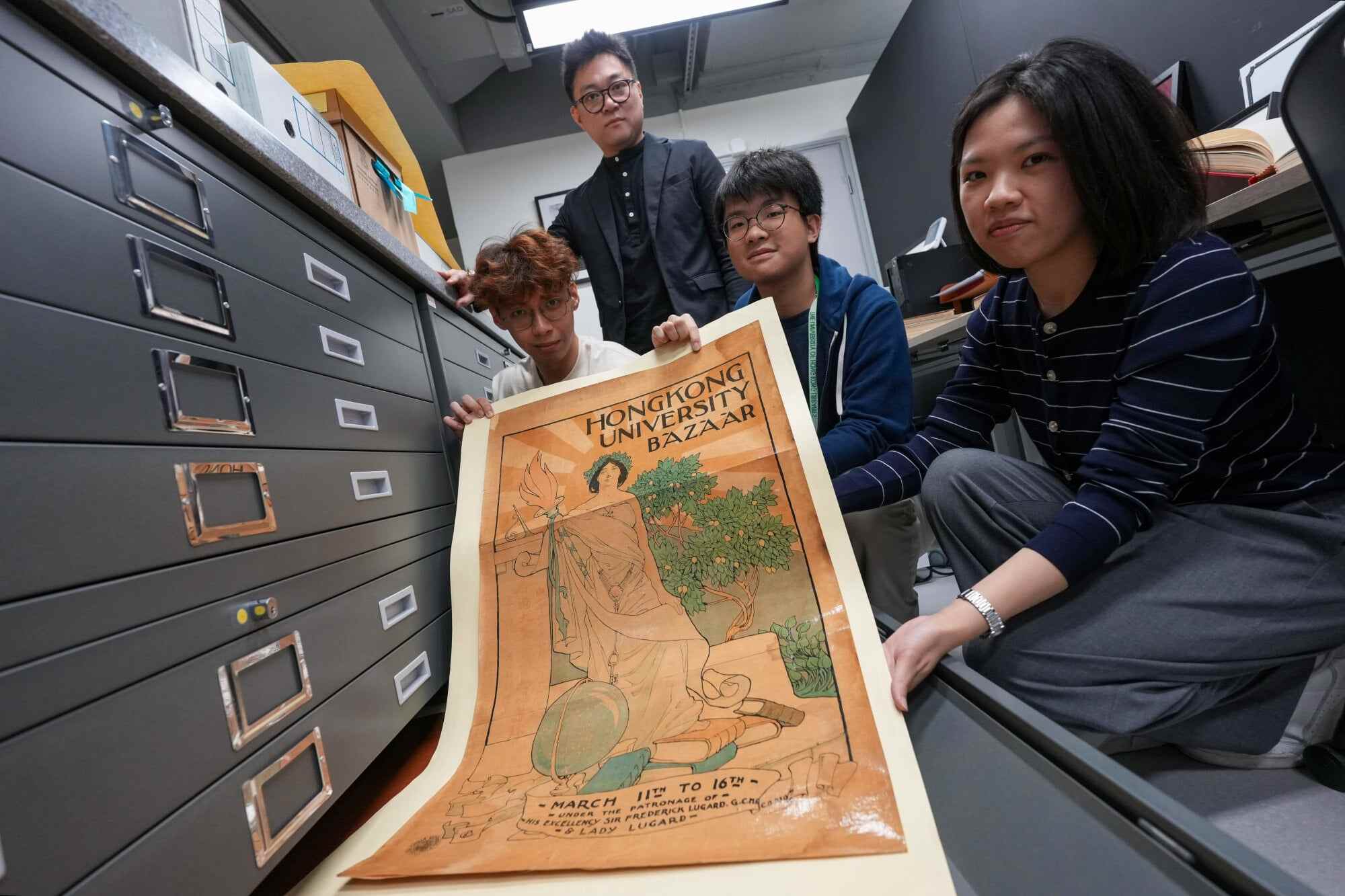 Archivists at the University of Hong Kong, Colin Loong (from left), Garfield Lam, Neil Lam and Sandy Sin, help preserve records of the institution’s history. Photo: Karma Lo