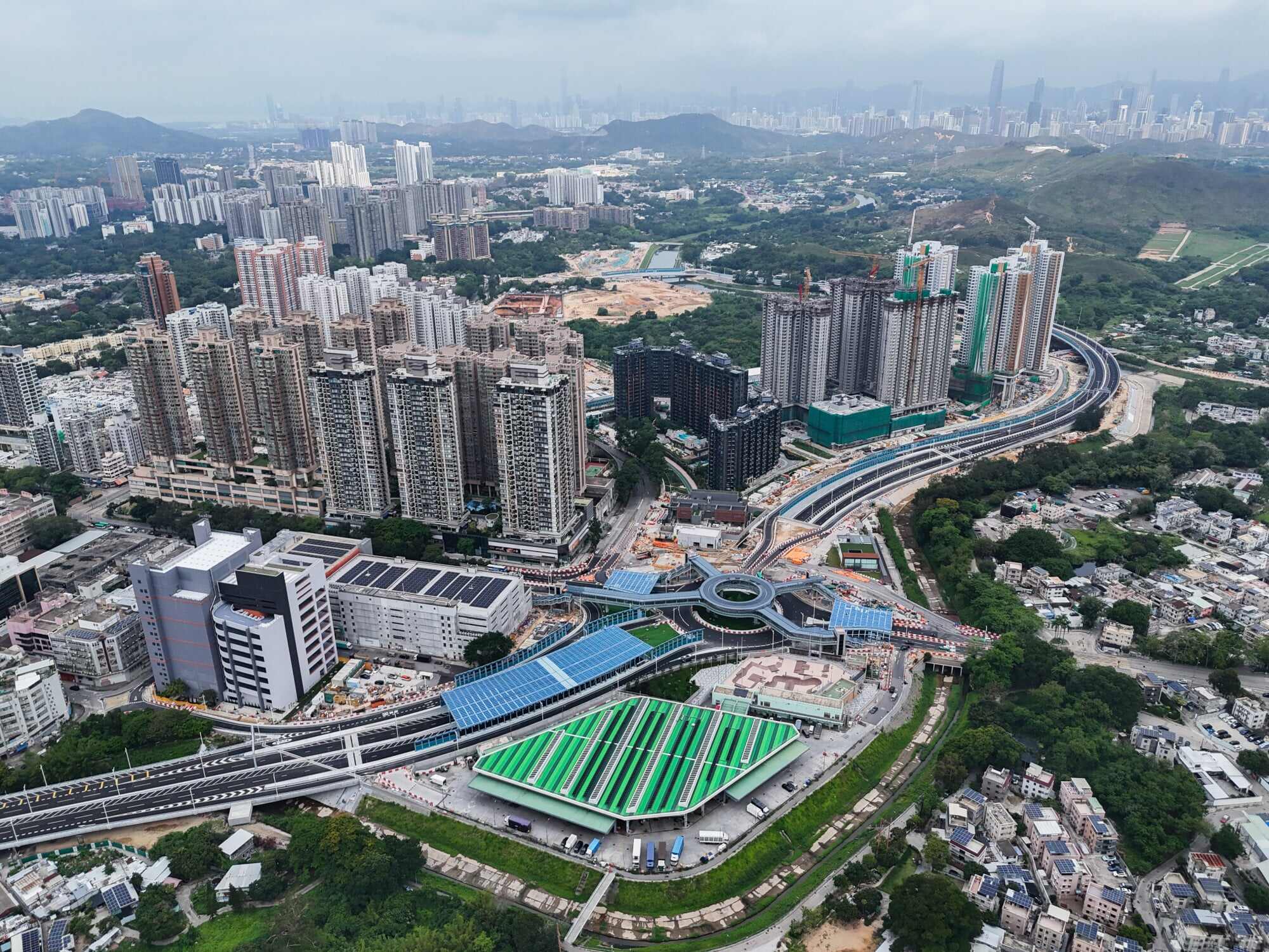 An view of the newly commissioned Fanling Bypass (Eastern Section) with Shenzhen’s skyline in the distance. Fanling Bypass (Eastern Section), the first major transport infrastructure in the Northern Metropolis border town development megaproject, will serve as an important bypass linking the North District of the New Territories with urban areas. Photo: Eugene Lee