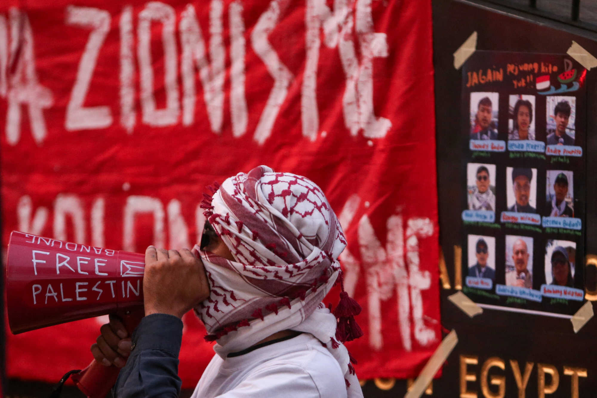A protester delivers a speech during a protest in solidarity with Indonesian nationals who were arrested aboard the Gaza-bound Global Sumud Flotilla in Bandung, West Java Province, Indonesia. Photo: Reuters