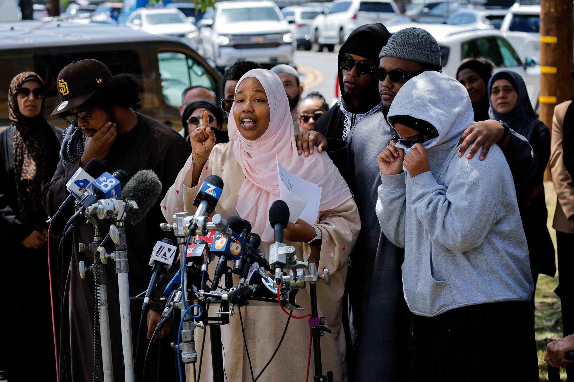 Hawaa Abdullah, the daughter of security guard Amin Abdullah, who was killed in a shooting, speaks during a press conference the next day. Photo: Reuters