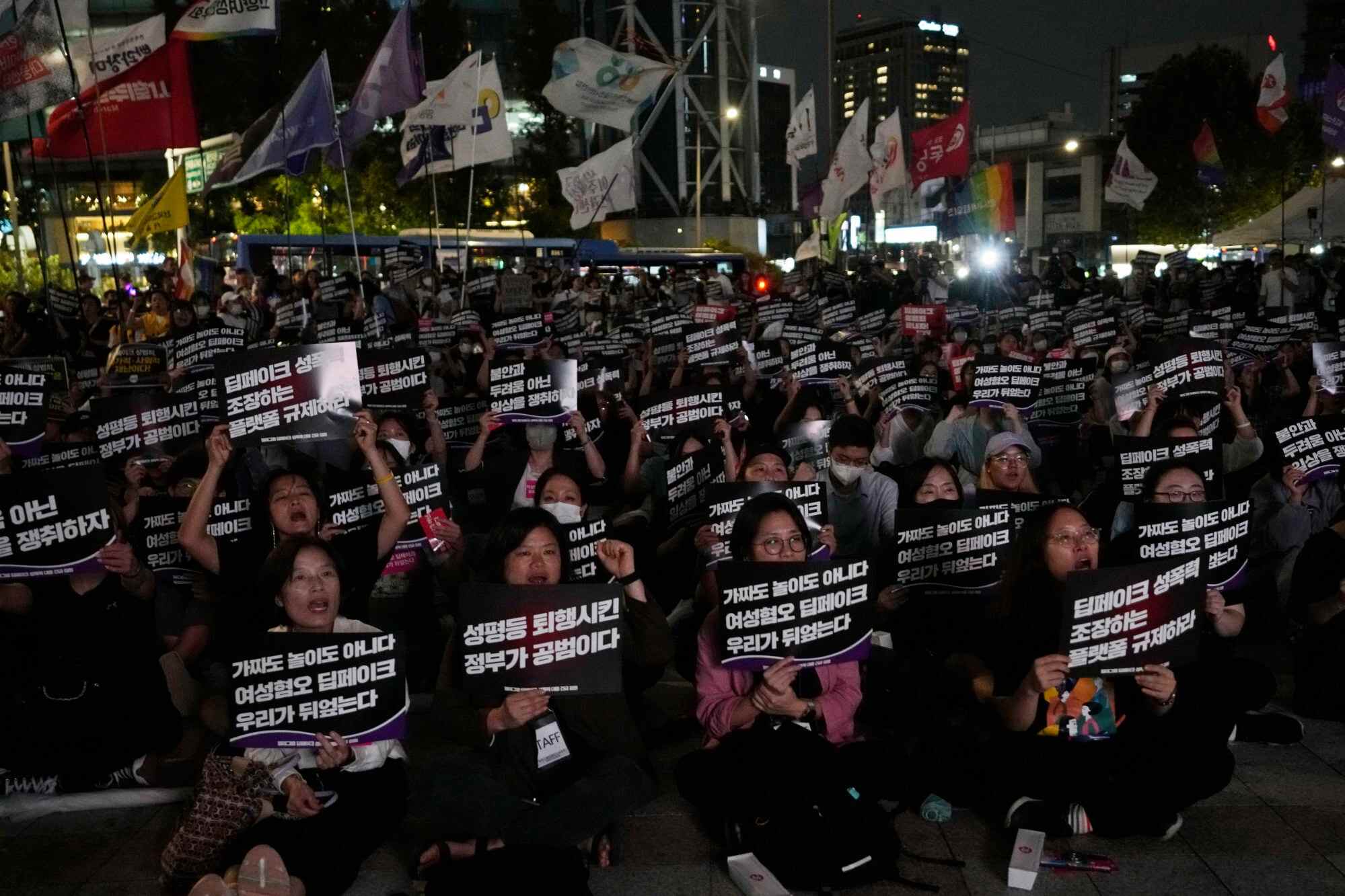 Activists stage a rally against illegal deepfake content in Seoul, South Korea, in 2024, calling for the government to enact appropriate countermeasures. The banners read “Regulate internet platforms that encourage deepfake sexual crimes”. Photo: AP