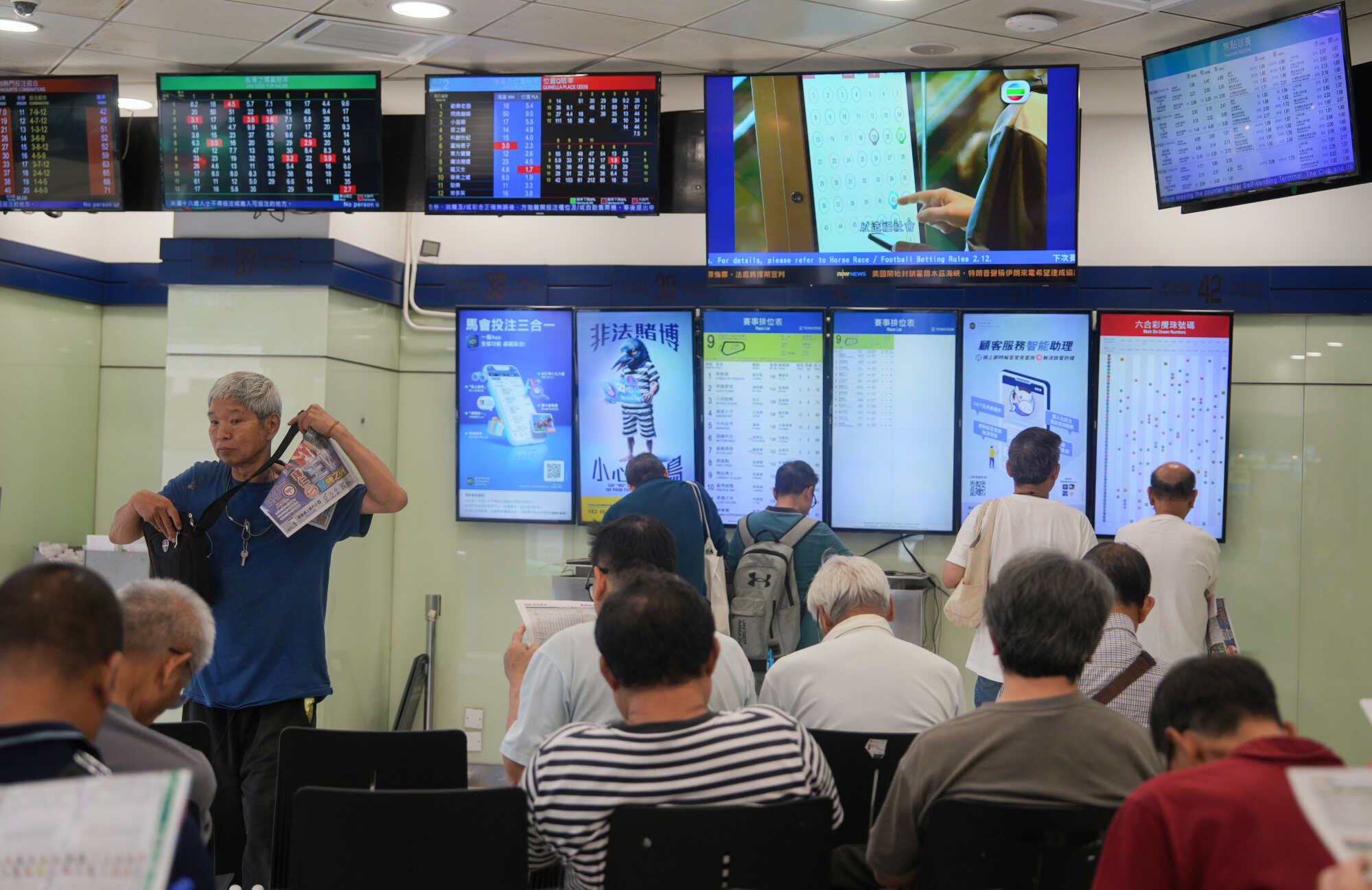 Citizens bet at an off-course betting branch at Kwong Fuk Road in Tai Po. Photo: Sam Tsang