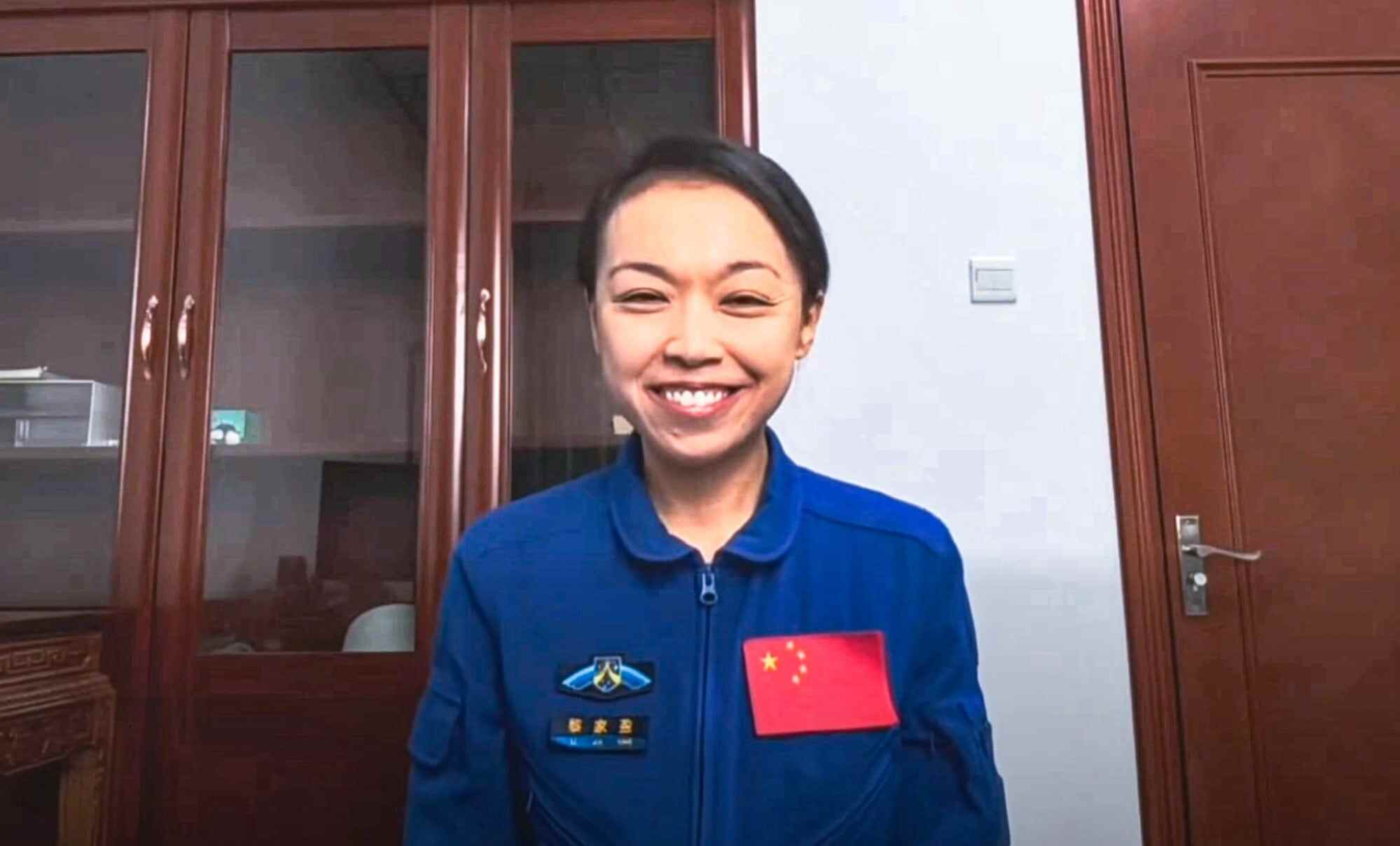 Chief Executive John Lee Ka-chiu held a video call with Hong Kong’s first astronaut, payload specialist Lai Ka-ying, ahead of the Shenzhou-23 mission to China’s Tiangong space station. Photo: Handout