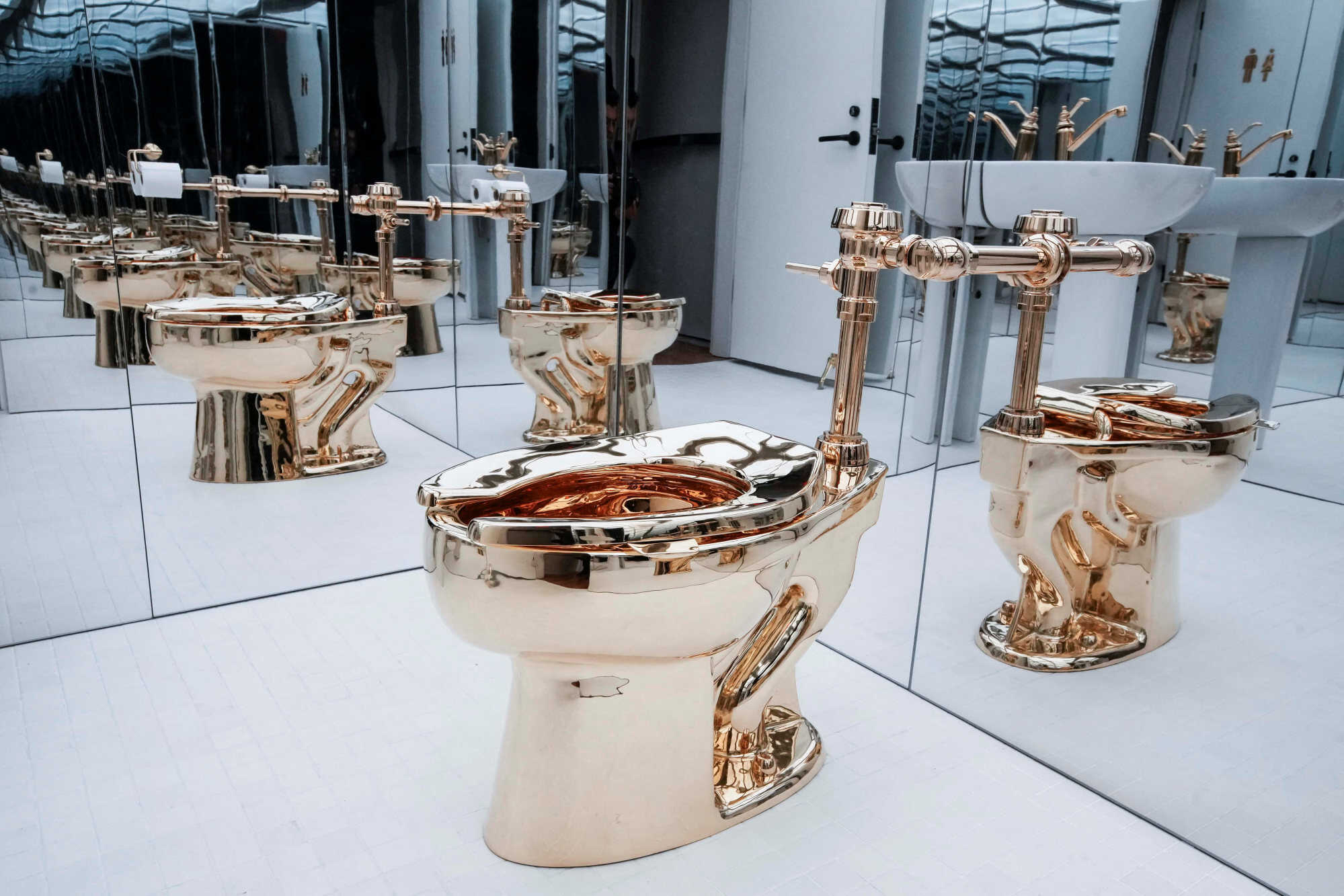 Maurizio Cattelan’s “America”, a fully functional toilet fashioned from just over 100 kilograms of solid 18-karat gold, is seen at a preview of auction house Sotheby’s headquarters in Manhattan, New York, in November. Photo: Reuters