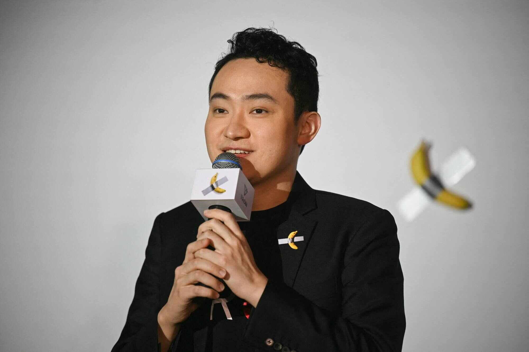Chinese-born crypto founder Justin Sun speaks before eating a banana artwork in Hong Kong on November 29, 2024. Photo: AFP